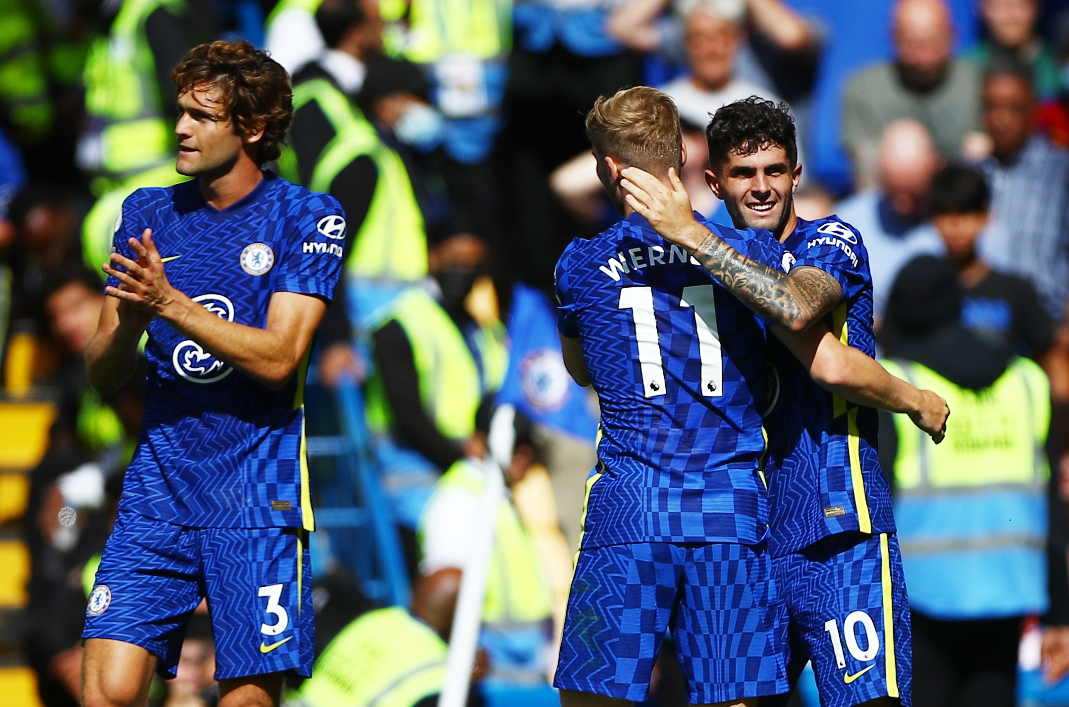 Soccer Football - Premier League - Chelsea v Crystal Palace - Stamford Bridge, London, Britain - August 14, 2021 Chelsea's Christian Pulisic celebrates scoring their second goal with Timo Werner and Marcos Alonso REUTERS