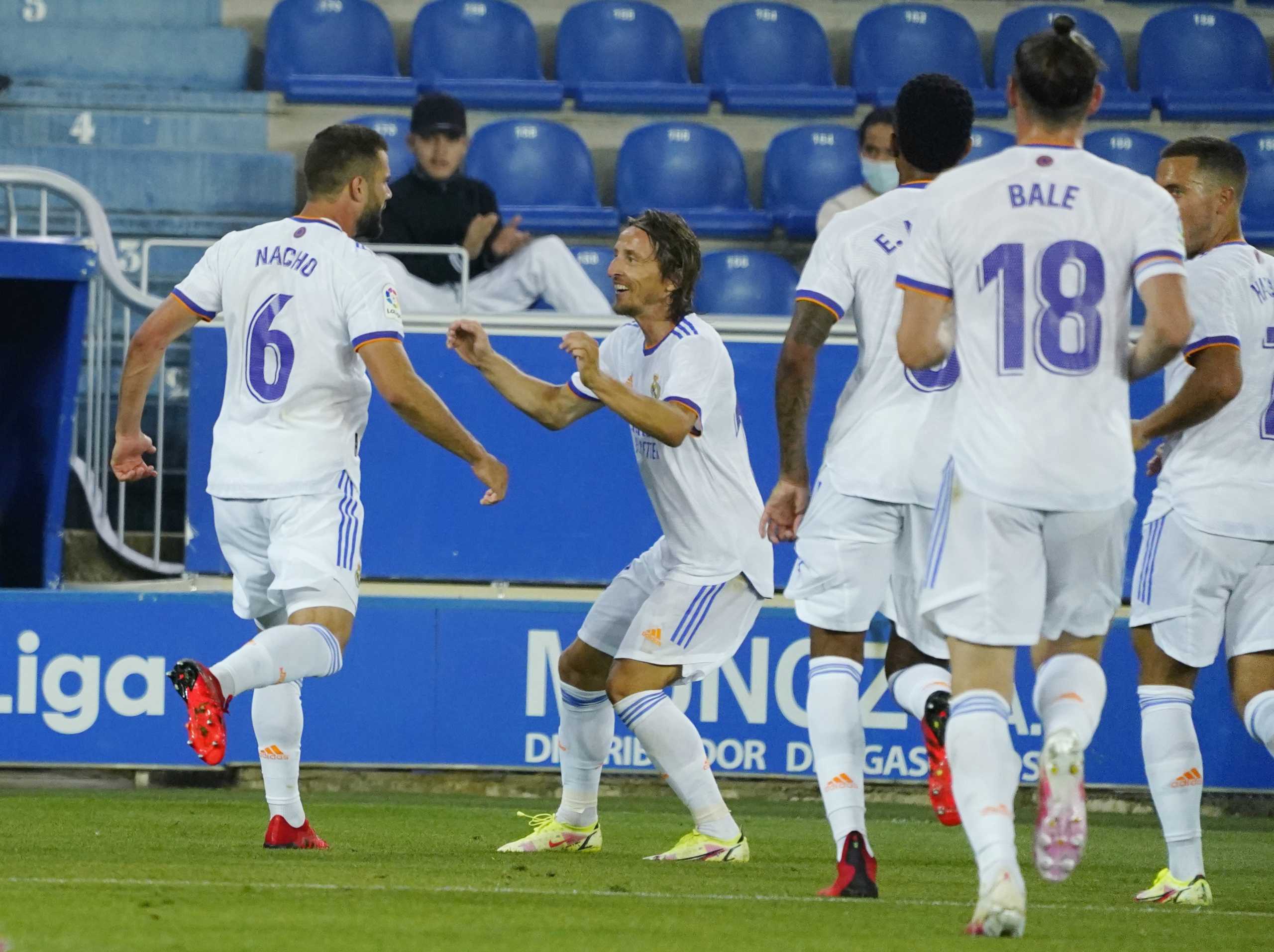 Soccer Football - LaLiga - Deportivo Alaves v Real Madrid - Estadio Mendizorroza, Vitoria-Gasteiz, Spain - August 14, 2021 Real Madrid's Nacho celebrates scoring their second goal tm REUTERS