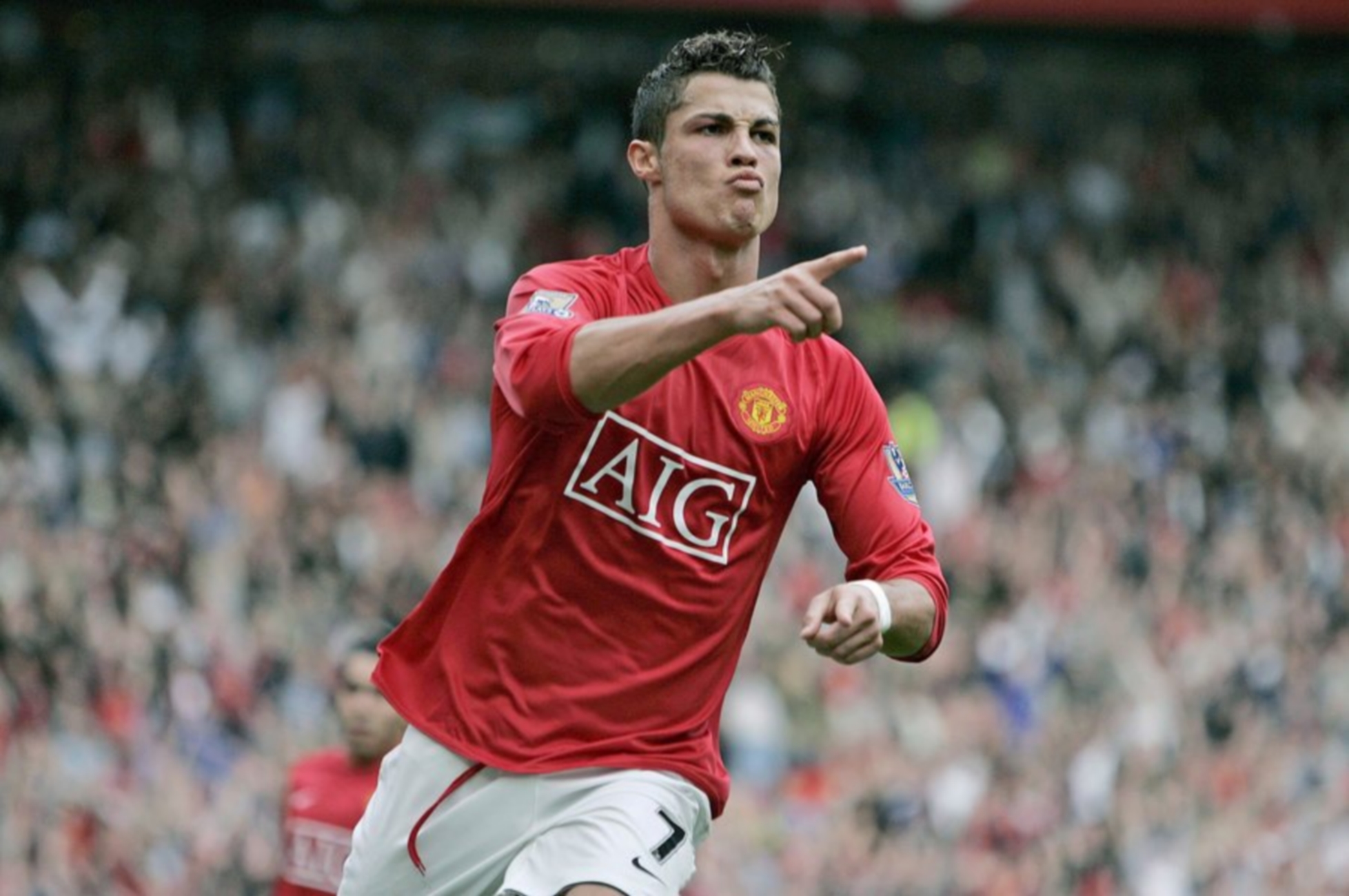 epa01311326 (FILE) A file picture dated 06 October 2007 shows Manchester United's Portuguese forward Cristiano Ronaldo celebrating after scoring against Wigan Athletic during the English Premiership soccer match at Old Trafford, Manchester, Britain. Cristiano Ronaldo has the chance to retain his English PFA Players' Player of the Year award after being named one of the six nominations for this season's prize on 11 April 2008. Ronaldo's dazzling form for Manchester United has taken Sir Alex Ferguson's side to the top of the Premier League and into the Champions League semi-finals.  EPA