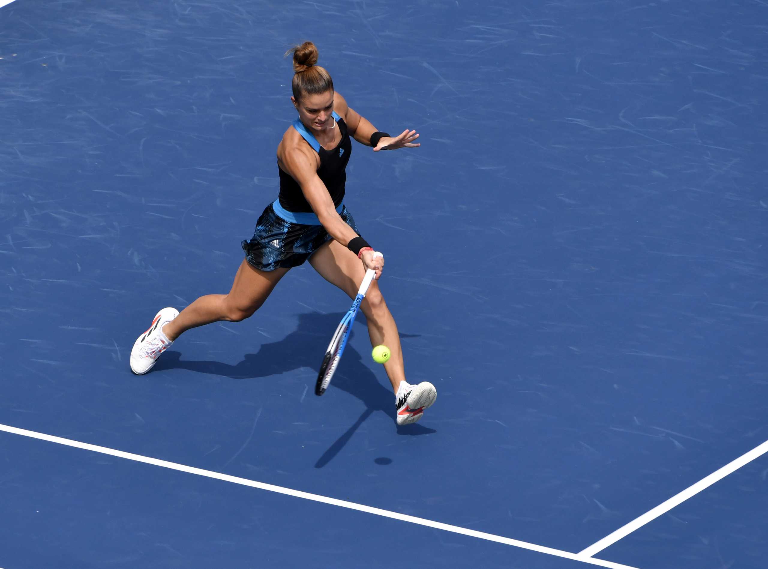 Aug 9, 2021; Montreal, Quebec, Canada; Maria Sakkari of Greece hits a shot against Maria Bouzkova of the Czech Republic (not pictured) during first round play at Stade IGA. Mandatory Credit: Eric Bolte-USA TODAY Sports
