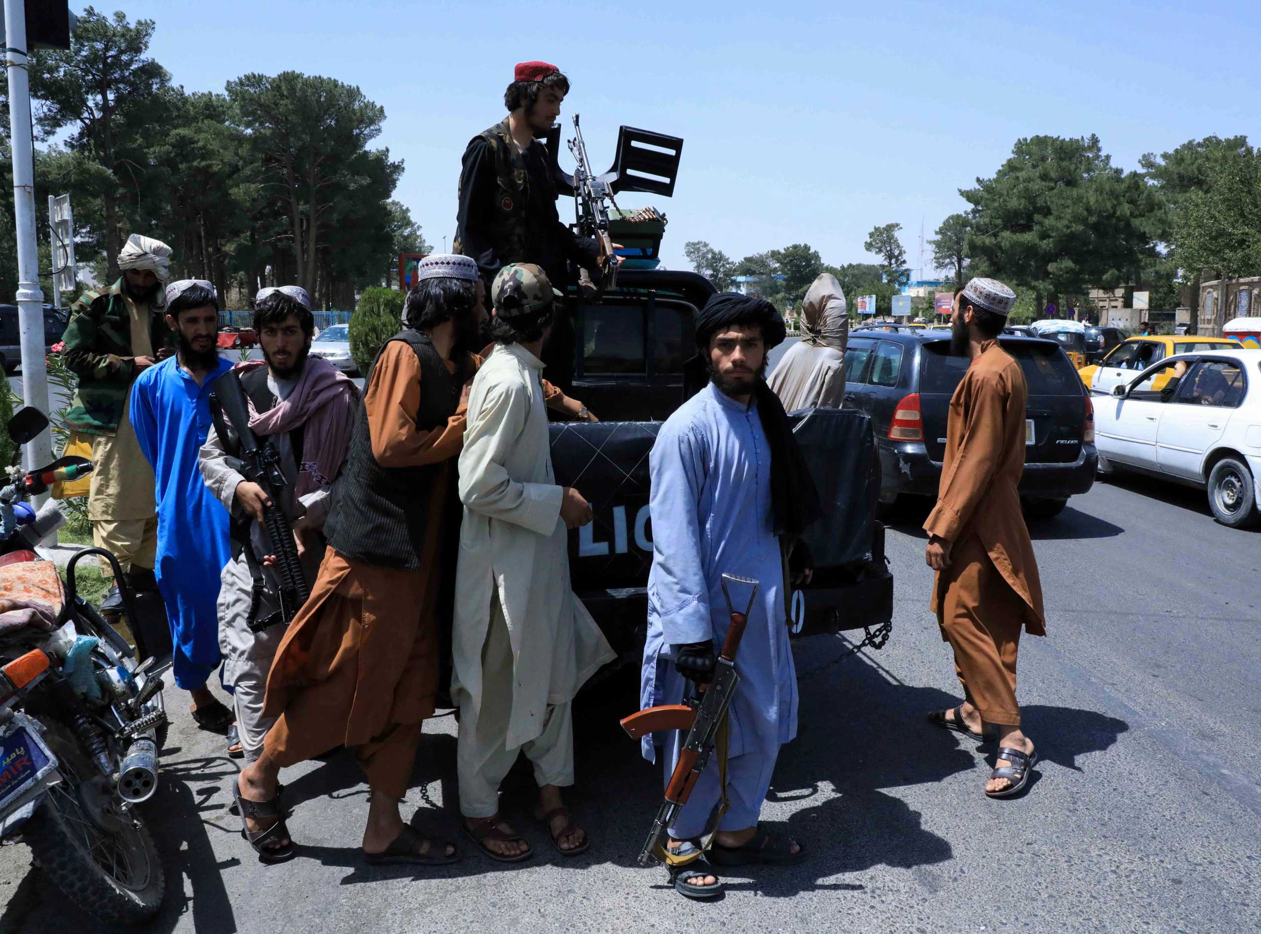 Taliban forces patrol a street in Herat, Afghanistan August 14, 2021. REUTERS