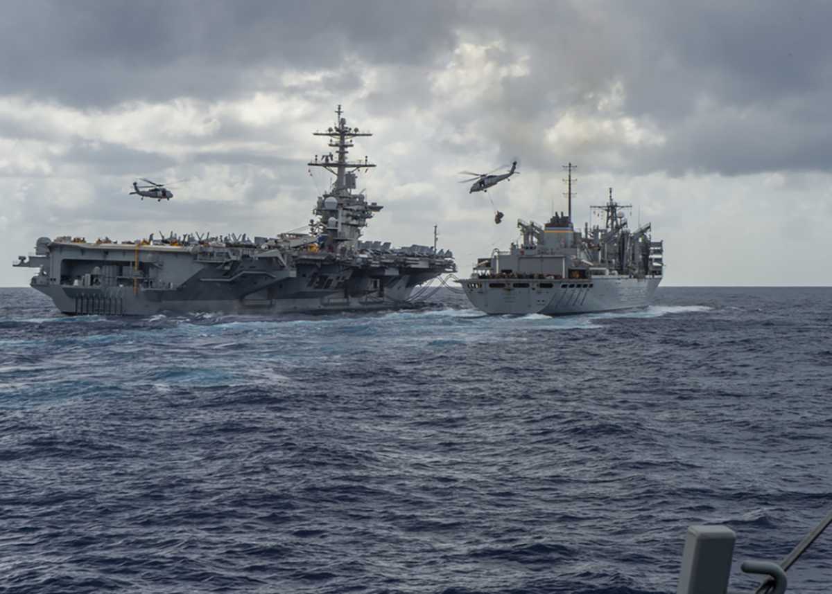 epa07568969 A handout photo made available by the US Navy showing the Nimitz-class aircraft carrier USS Abraham Lincoln (CVN 72) conducting a replenishment-at-sea on 08 May 2019, with the fast combat support ship USNS Arctic (T-AOE 9), while MH-60S Sea Hawk helicopters assigned to the 'Nightdippers' of Helicopter Maritime Strike Squadron (HSM) 5, transfer stores between the ships. Abraham Lincoln is underway as part of the Abraham Lincoln Carrier Strike Group (ABECSG) deployment in support of maritime security cooperation efforts in the U.S. 5th, U.S. 6th and U.S. 7th Fleet areas of operation. Media reports on 14 May 2019 state that the US has deployed the USS Abraham Lincoln carrier and other ships to the Gulf of Oman and has sent a team of experienced investigators to the United Arab Emirates (UAE) the United Arab Emirates (UAE) after the UAE Foreign Office reported on 13 May 2019 that four commercial vessels have been targeted by sabotage operations near UAE territorial waters. Saudi Arabia's energy minister Khalid al-Falih added that two Saudi oil tankers had been targeted in the attack.  EPA