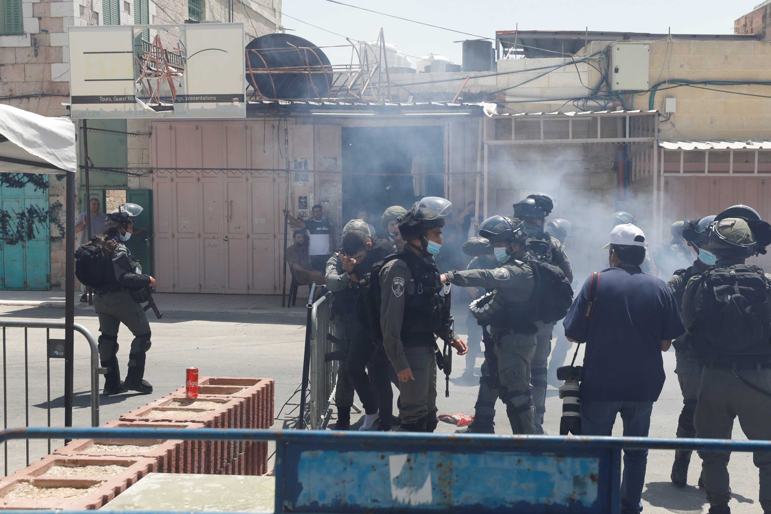 Israeli police officers detain a Palestinian man after Friday prayers near the Ibrahimi Mosque, which Jews call the Tomb of the Patriarchs, in Hebron in the Israeli-occupied West Bank August 13, 2021. REUTERS