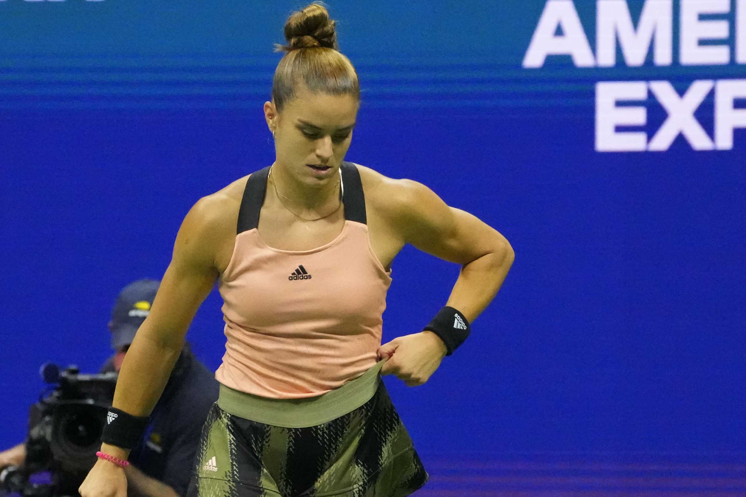 Sep 9, 2021; Flushing, NY, USA; Maria Sakkari of Greece tugs at her skirt between points against Emma Raducanu of Great Britain (not pictured) on day eleven of the 2021 U.S. Open tennis tournament at USTA Billie Jean King National Tennis Center. Mandatory Credit: Danielle Parhizkaran-USA TODAY Sports