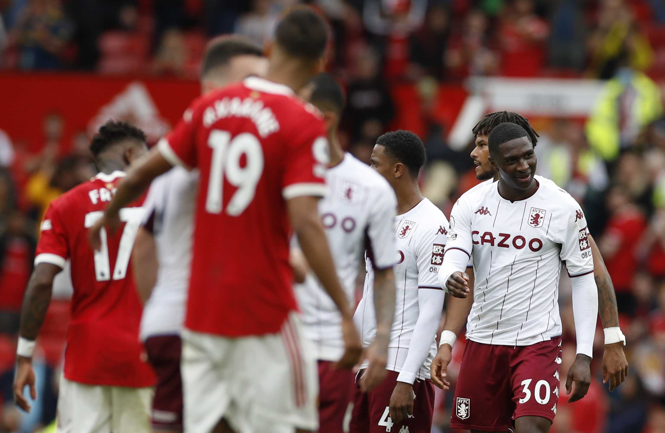 Soccer Football - Premier League - Manchester United v Aston Villa - Old Trafford, Manchester, Britain - September 25, 2021 Aston Villa's Kortney Hause celebrates after the match REUTERS