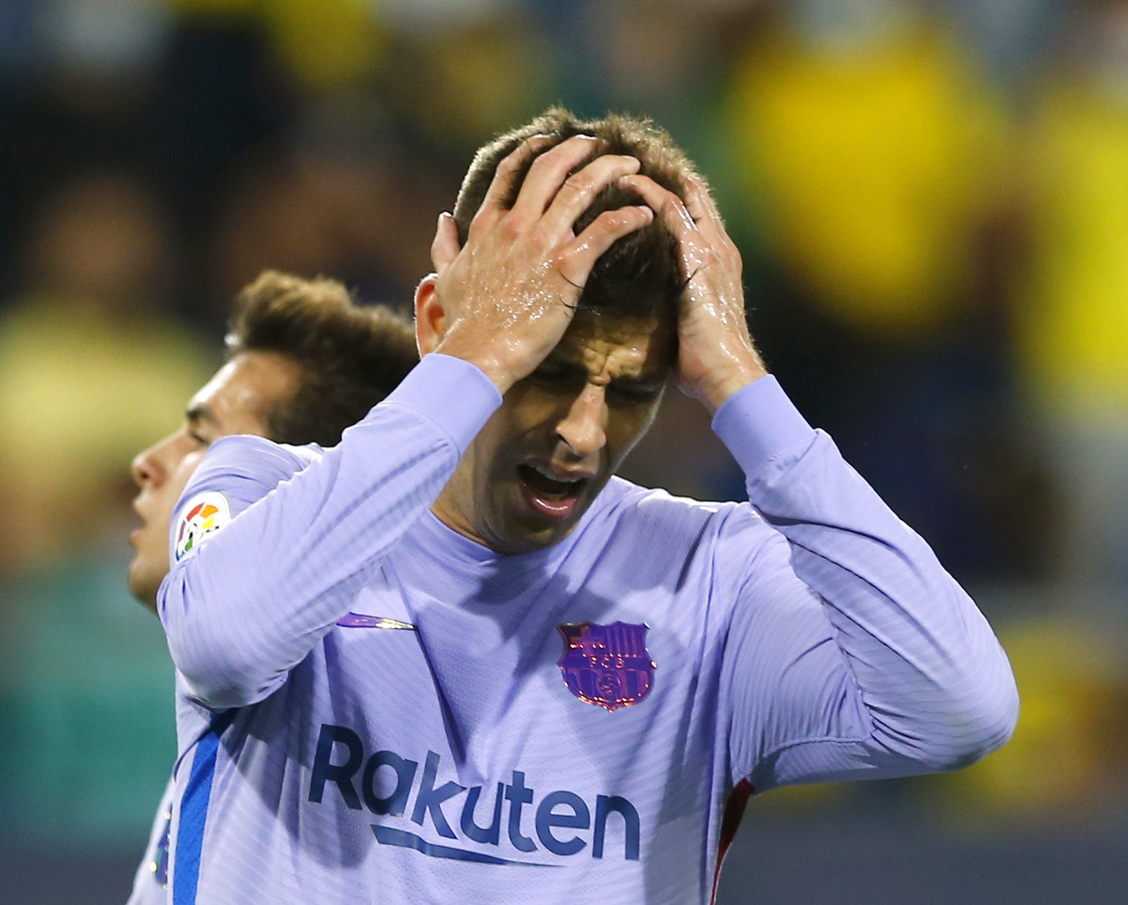 Soccer Football - LaLiga - Cadiz v FC Barcelona - Estadio Nuevo Mirandilla, Cadiz, Spain - September 23, 2021 FC Barcelona's Gerard Pique looks dejected REUTERS