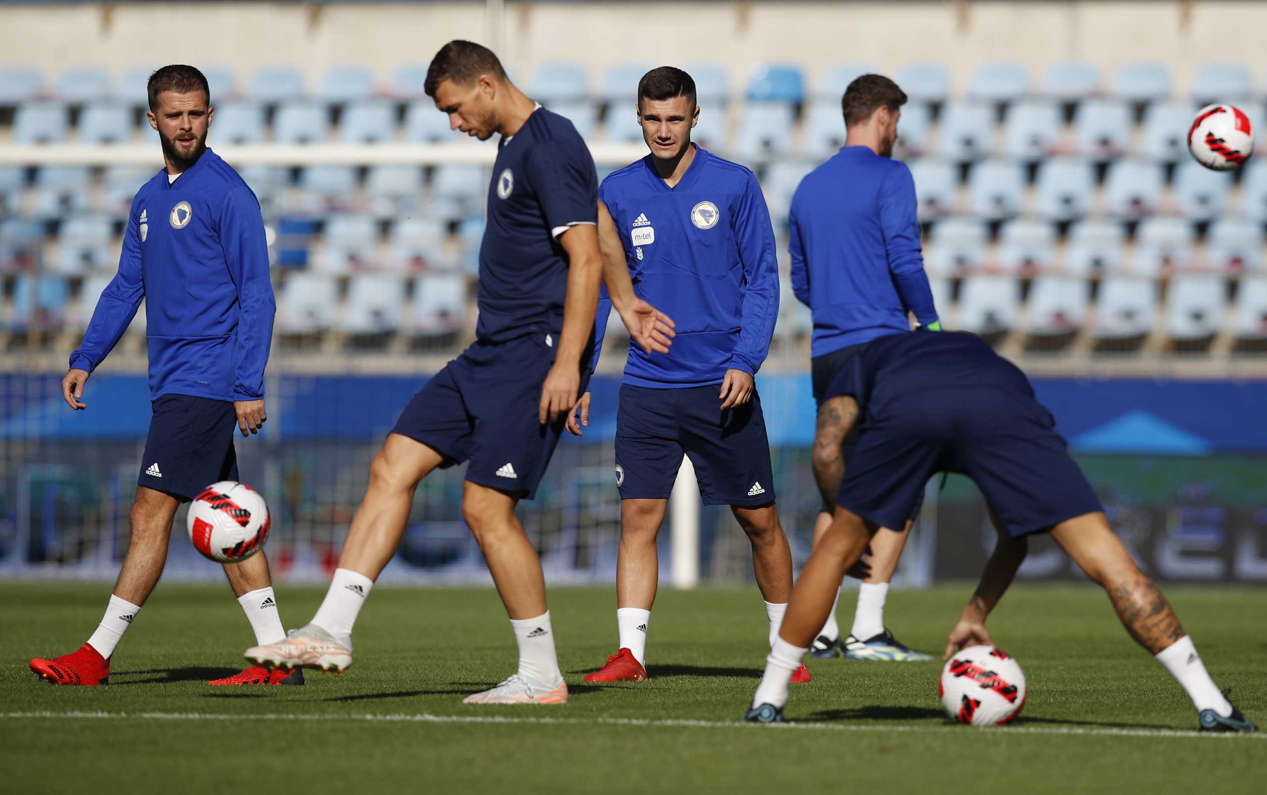 Soccer Football - World Cup - UEFA Qualifiers - Bosnia and Herzegovina training - Meinau Stadium, Strasbourg, France - August 31, 2021 Bosnia and Herzegovina's Edin Dzeko and Miralem Pjanic during training REUTERS