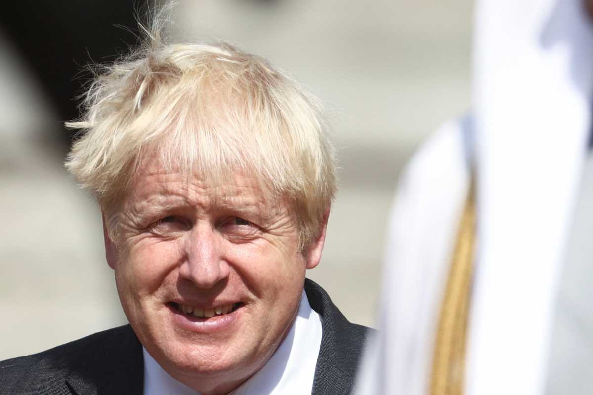 Britain's Prime Minister Boris Johnson looks on as he welcomes Abu Dhabi's Crown Prince Sheikh Mohammed bin Zayed al-Nahyan in Downing Street, London, Britain, September 16, 2021. REUTERS