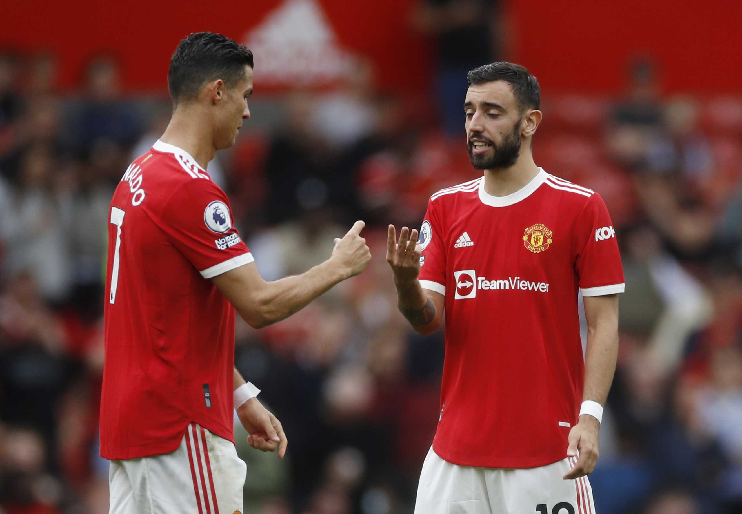 Soccer Football - Premier League - Manchester United v Aston Villa - Old Trafford, Manchester, Britain - September 25, 2021 Manchester United's Cristiano Ronaldo and Bruno Fernandes REUTERS