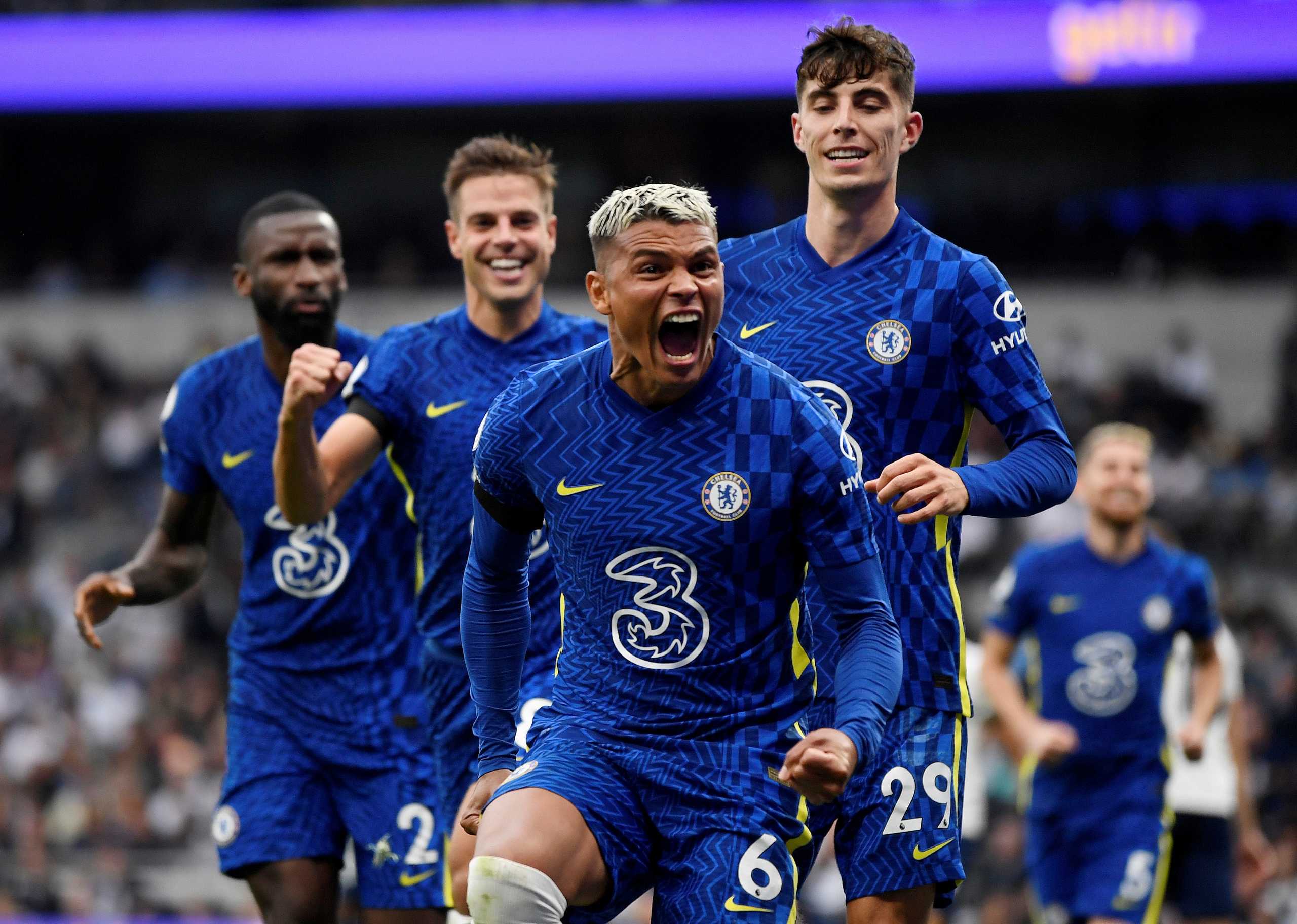 Soccer Football - Premier League - Tottenham Hotspur v Chelsea - Tottenham Hotspur Stadium, London, Britain - September 19, 2021 Chelsea's Thiago Silva celebrates scoring their first goal with Kai Havertz and Cesar Azpilicueta REUTERS