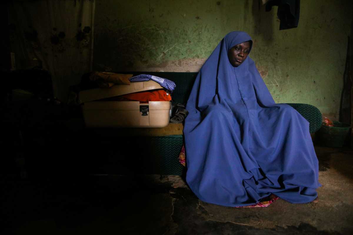 Aminu Salisu's wife and mother of one of the children kidnapped by bandits at an Islamic day school sits in her room in Tegina, Niger State, Nigeria August 11, 2021. Picture taken August 11, 2021. REUTERS