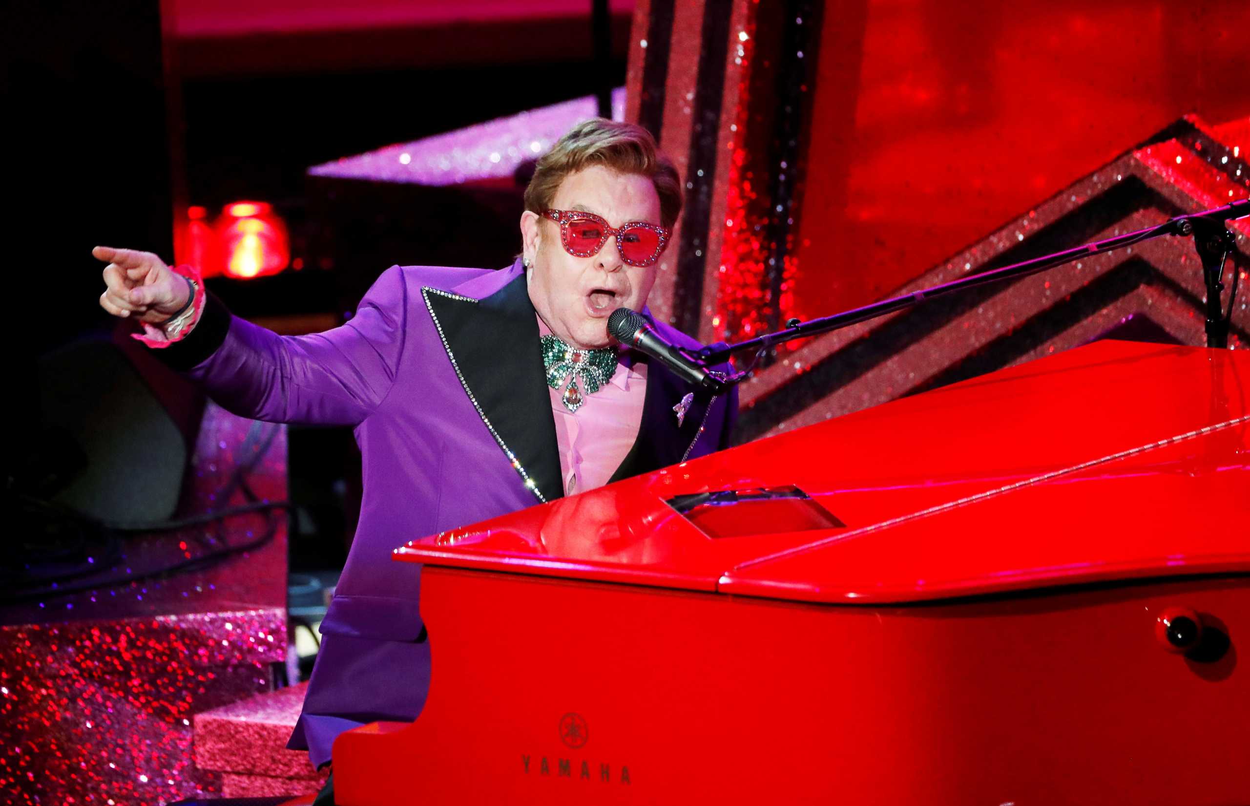 FILE PHOTO: Elton John performs "(I’m Gonna) Love Me Again" from Rocketman during the Oscars show at the 92nd Academy Awards in Hollywood, Los Angeles, California, U.S., February 9, 2020. REUTERS