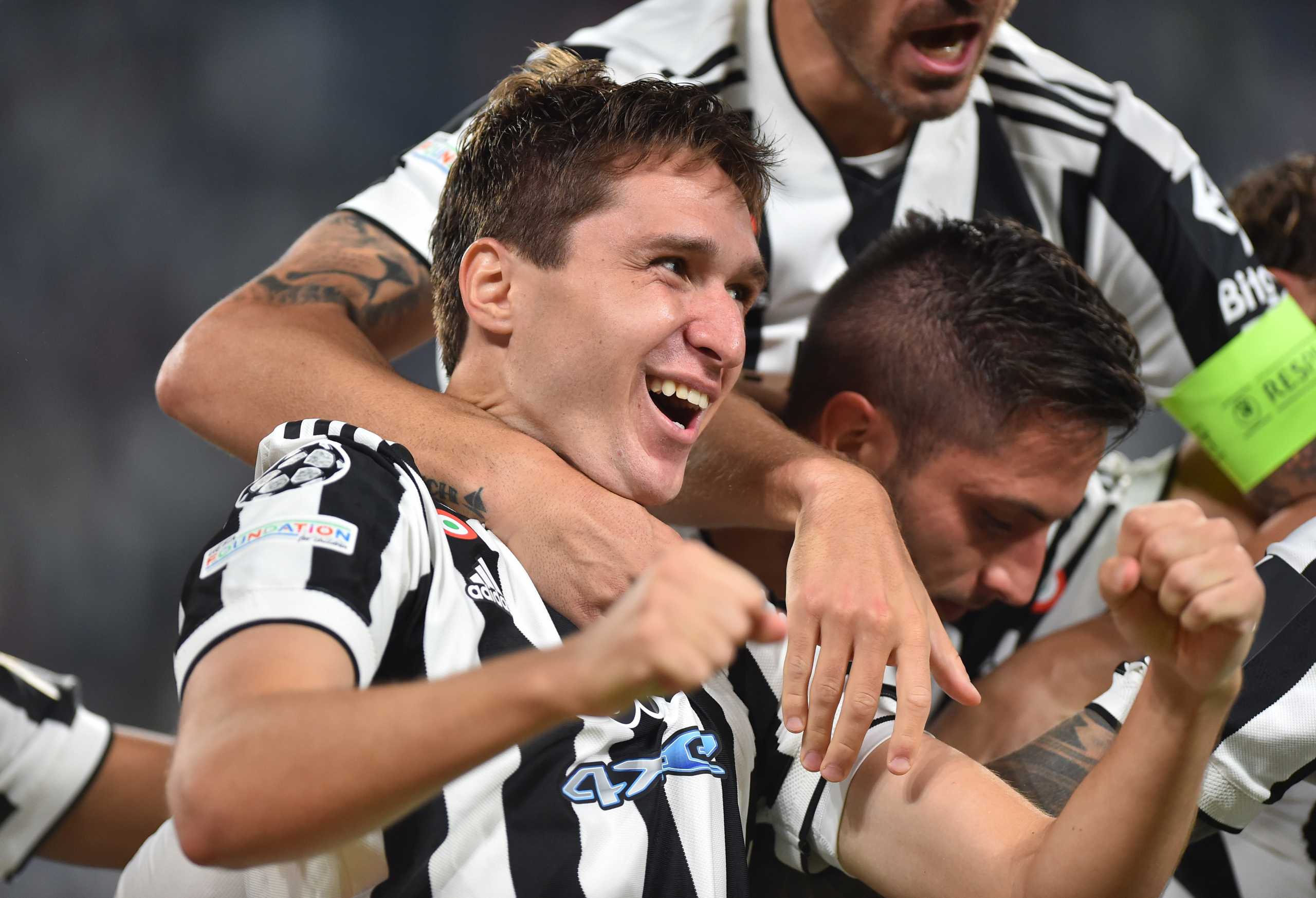 Soccer Football - Champions League - Group H - Juventus v Chelsea - Allianz Stadium, Turin, Italy - September 29, 2021 Juventus' Federico Chiesa celebrates scoring their first goal with teammates REUTERS