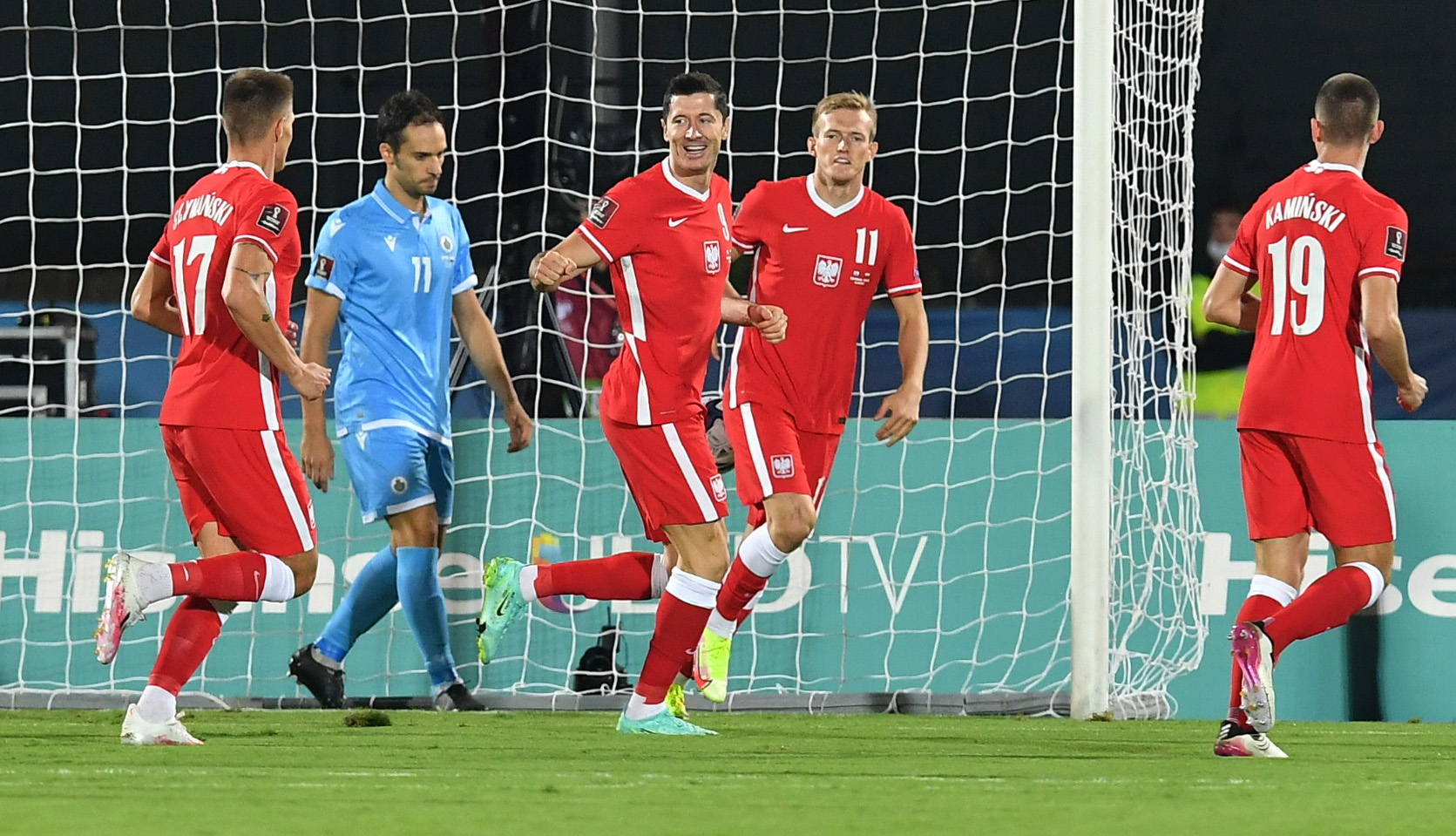 Soccer Football - World Cup - UEFA Qualifiers - Group I - San Marino v Poland - San Marino Stadium, Serravalle, San Marino - September 5, 2021  Poland's Robert Lewandowski celebrates scoring their first goal with teammates REUTERS