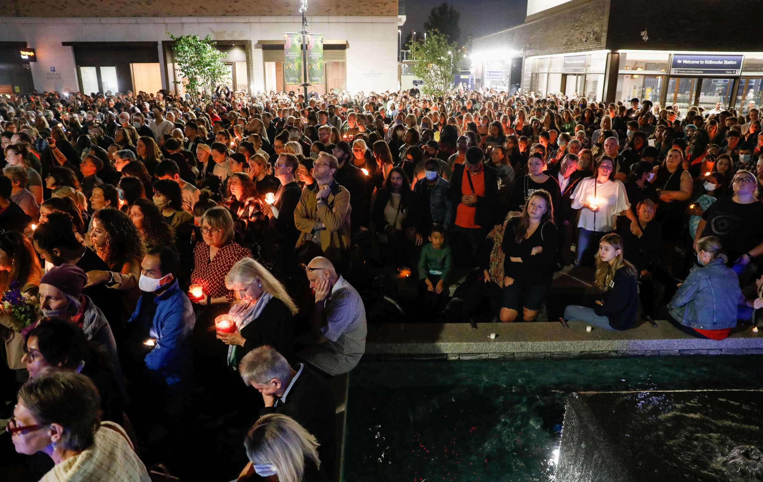 People attend a vigil in memory of Sabina Nessa, a teacher who was murdered in Pegler Square, in London, Britain September 24, 2021. REUTERS