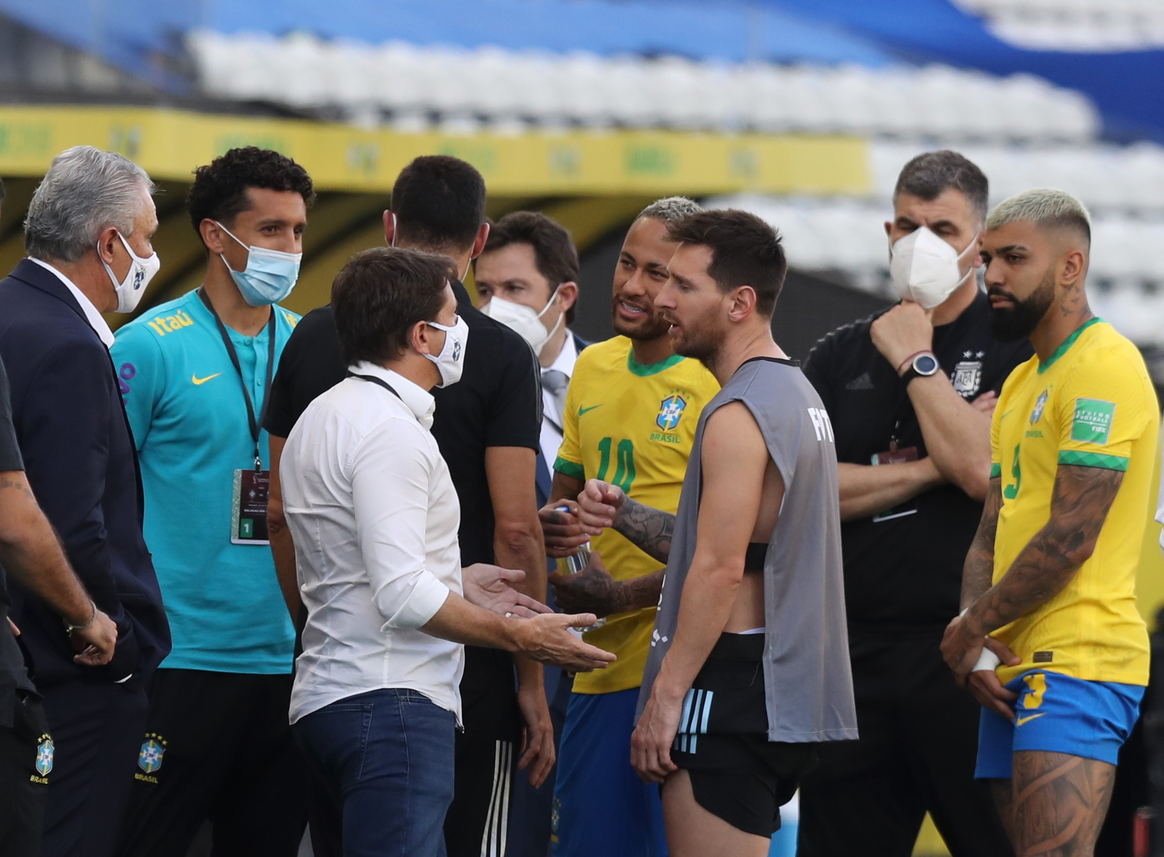 Soccer Football - World Cup - South American Qualifiers - Brazil v Argentina - Arena Corinthians, Sao Paulo, Brazil - September 5, 2021 Argentina's Lionel Messi and Brazil's Neymar are seen as play is interrupted after Brazilian health officials objected to the participation of three Argentine players they say broke quarantine rules REUTERS