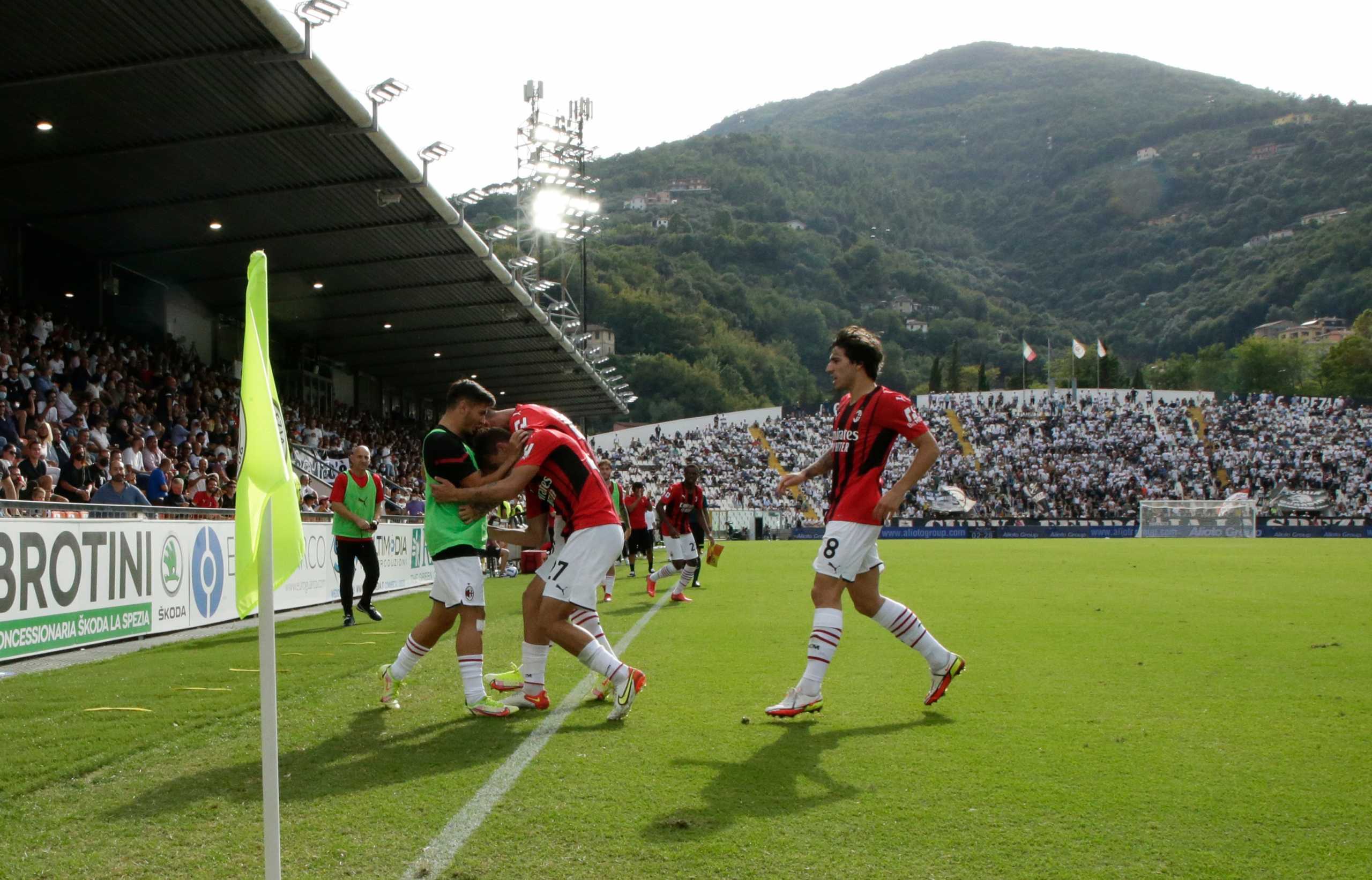 Soccer Football - Serie A - Spezia Calcio v AC Milan - Stadio Alberto-Picco, La Spezia, Italy - September 25, 2021 AC Milan's Daniel Maldini celebrates scoring their first goal with teammates REUTERS