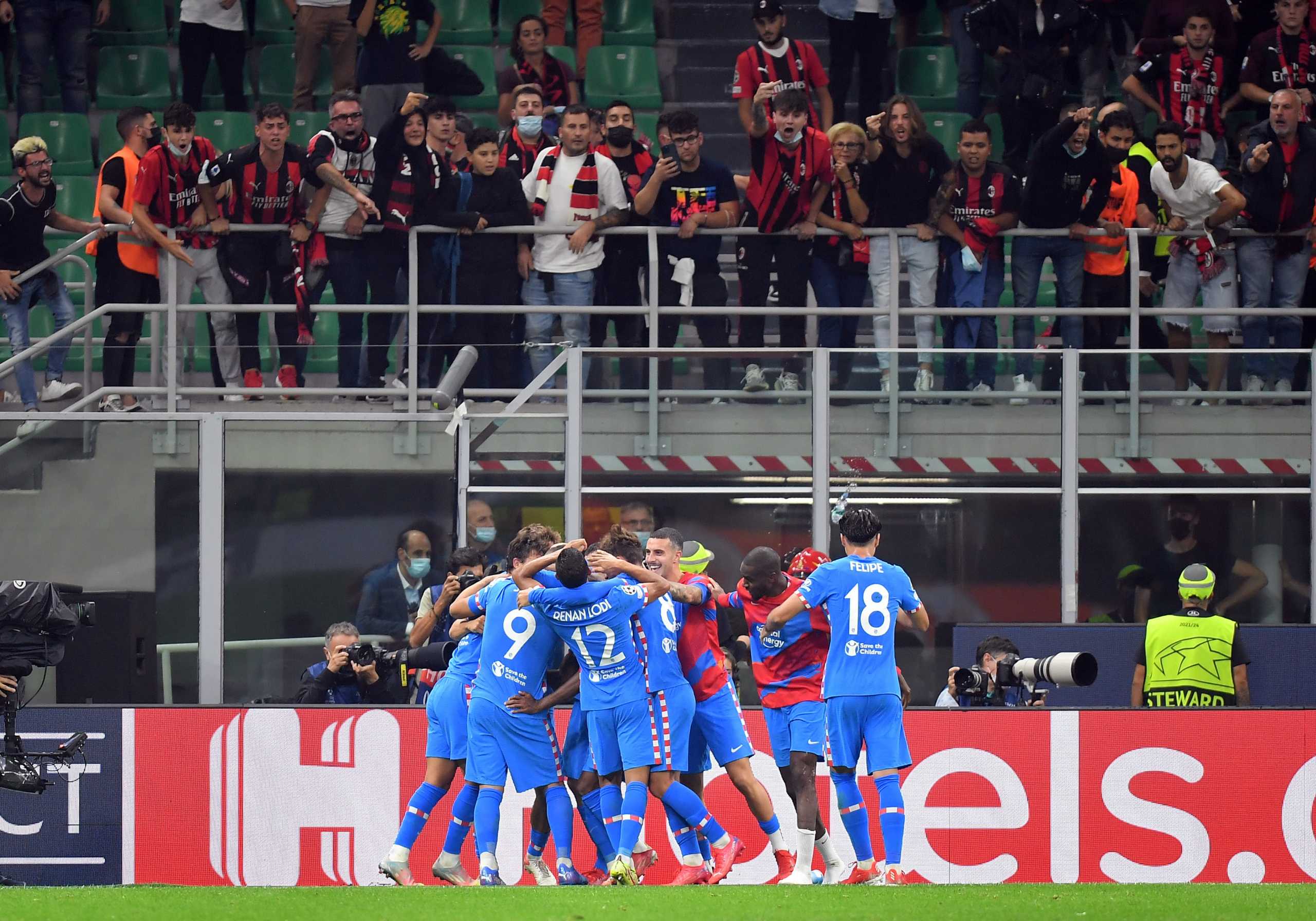 Soccer Football - Champions League - Group B - AC Milan v Atletico Madrid - San Siro, Milan, Italy - September 28, 2021  Atletico Madrid's Luis Suarez celebrates scoring their second goal with teammates REUTERS