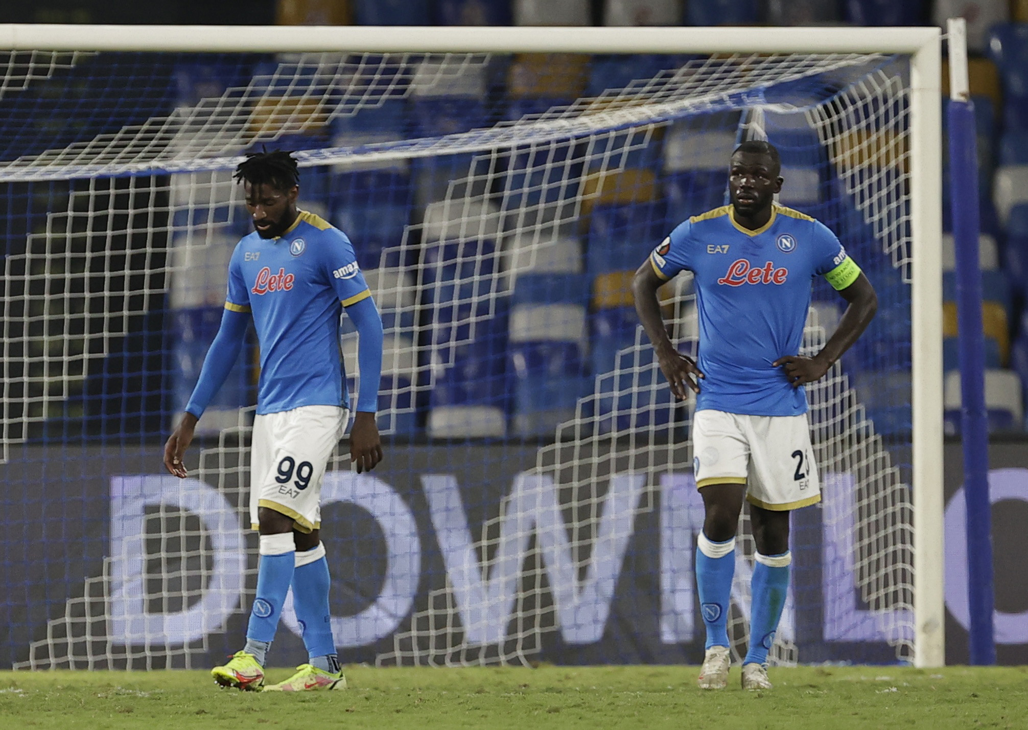 Soccer Football - Europa League - Group C - Napoli v Spartak Moscow - Stadio Diego Armando Maradona, Naples, Italy - September 30, 2021   Napoli's Andre-Frank Zambo Anguissa and Kalidou Koulibaly look dejected after the match REUTERS