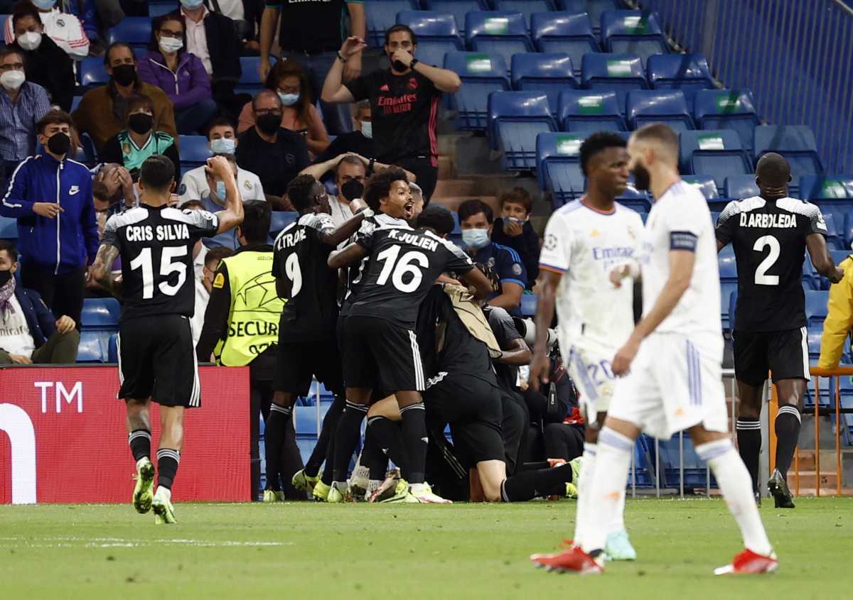 Soccer Football - Champions League - Group D - Real Madrid v Sheriff Tiraspol - Santiago Bernabeu, Madrid, Spain - September 28, 2021 Sheriff Tiraspol's Sebastien Thill celebrates scoring their second goal with teammates REUTERS