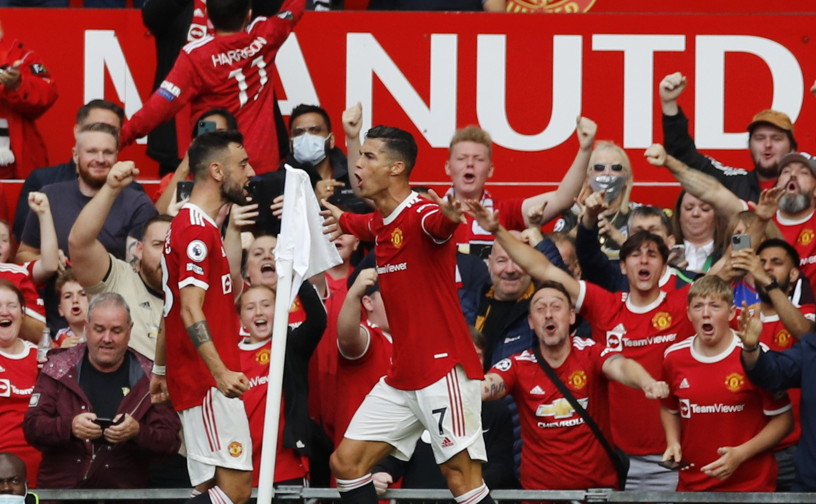 Soccer Football - Premier League - Manchester United v Newcastle United - Old Trafford, Manchester, Britain - September 11, 2021 Manchester United's Cristiano Ronaldo celebrates scoring their first goal with Bruno Fernandes REUTERS