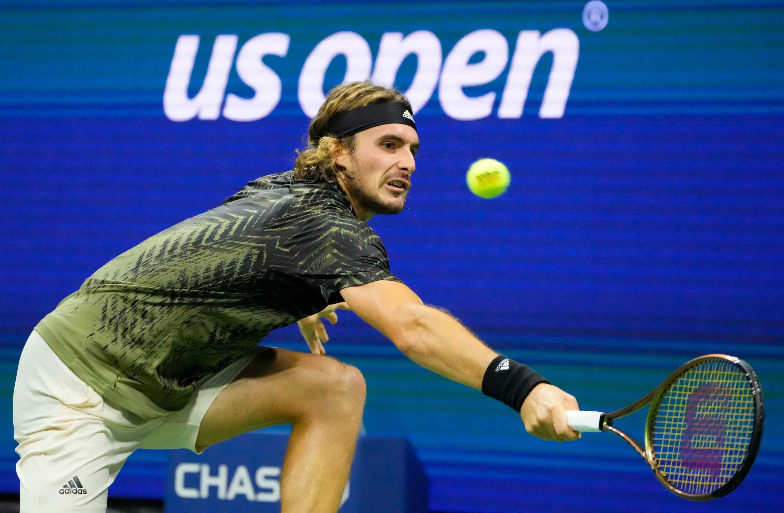 Sep 1, 2021; Flushing, NY, USA;  Stefanos Tsitsipas of Greece hits to Adrian Mannarino of France on day three of the 2021 U.S. Open tennis tournament at USTA Billie King National Tennis Center. Mandatory Credit: Robert Deutsch-USA TODAY Sports