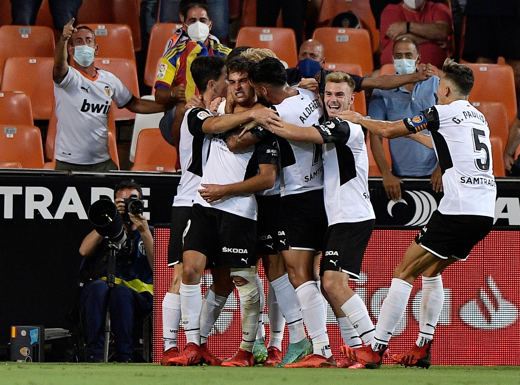 Soccer Football - LaLiga - Valencia v Real Madrid - Mestalla, Valencia, Spain - September 19, 2021  Valencia's Hugo Duro celebrates scoring their first goal with teammates REUTERS