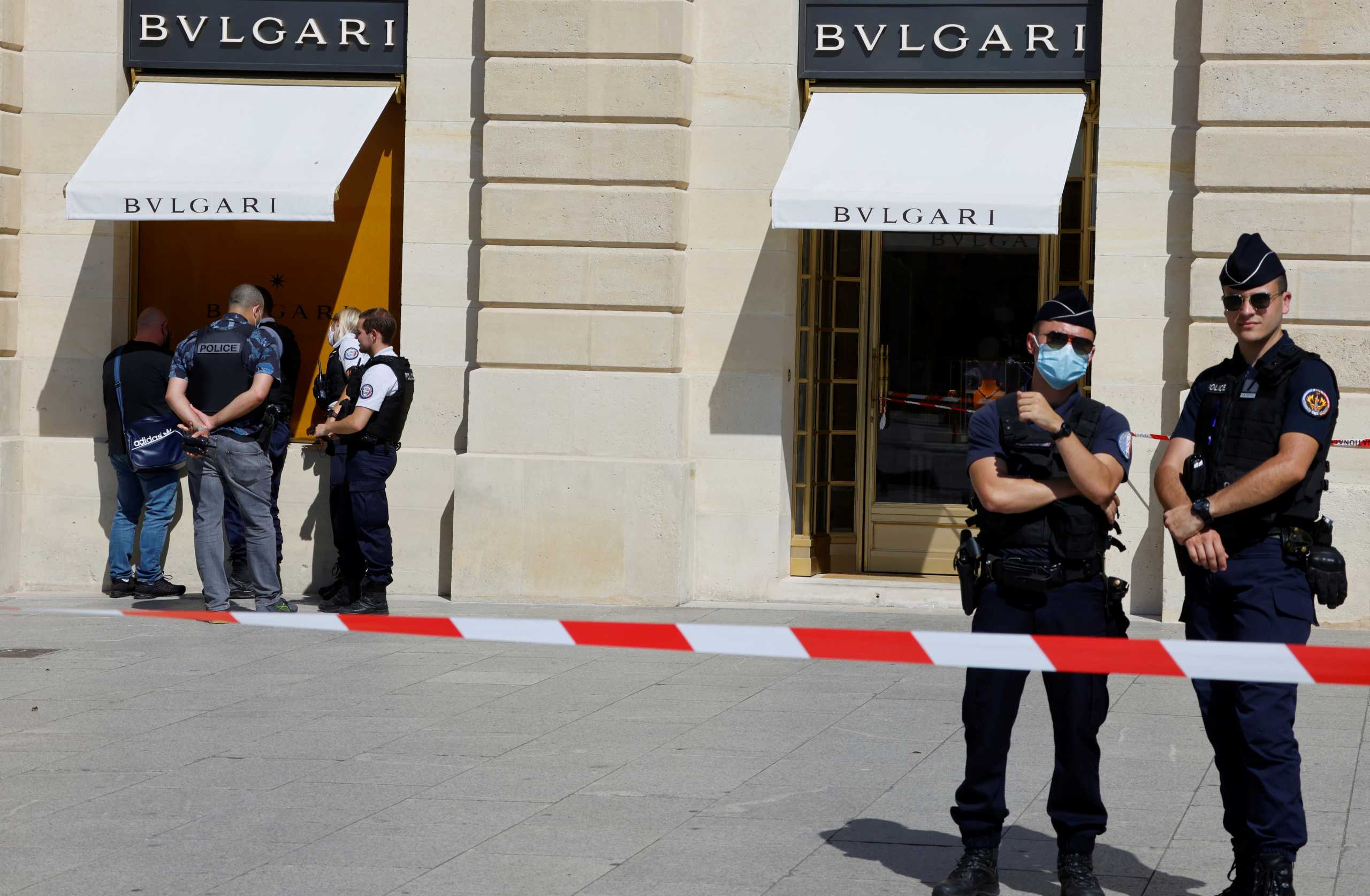 French police stand in front of the Bulgari jewellery store following a robbery at Place Vendome in Paris, France, September 7, 2021. REUTERS