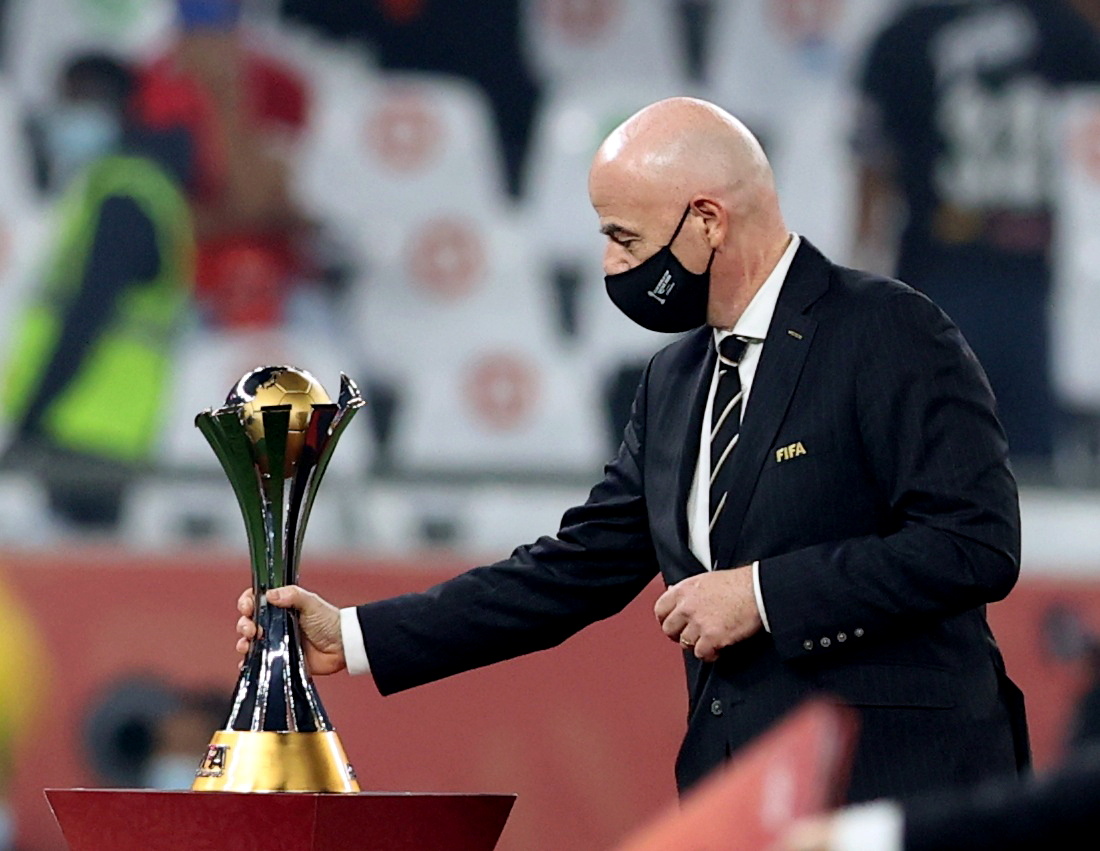 FILE PHOTO: Soccer Football - Club World Cup - Final - Bayern Munich v Tigres UANL - Education City Stadium, Al Rayyan, Qatar - February 11, 2021 Fifa President Gianni Infantino with the Club World Cup trophy REUTERS