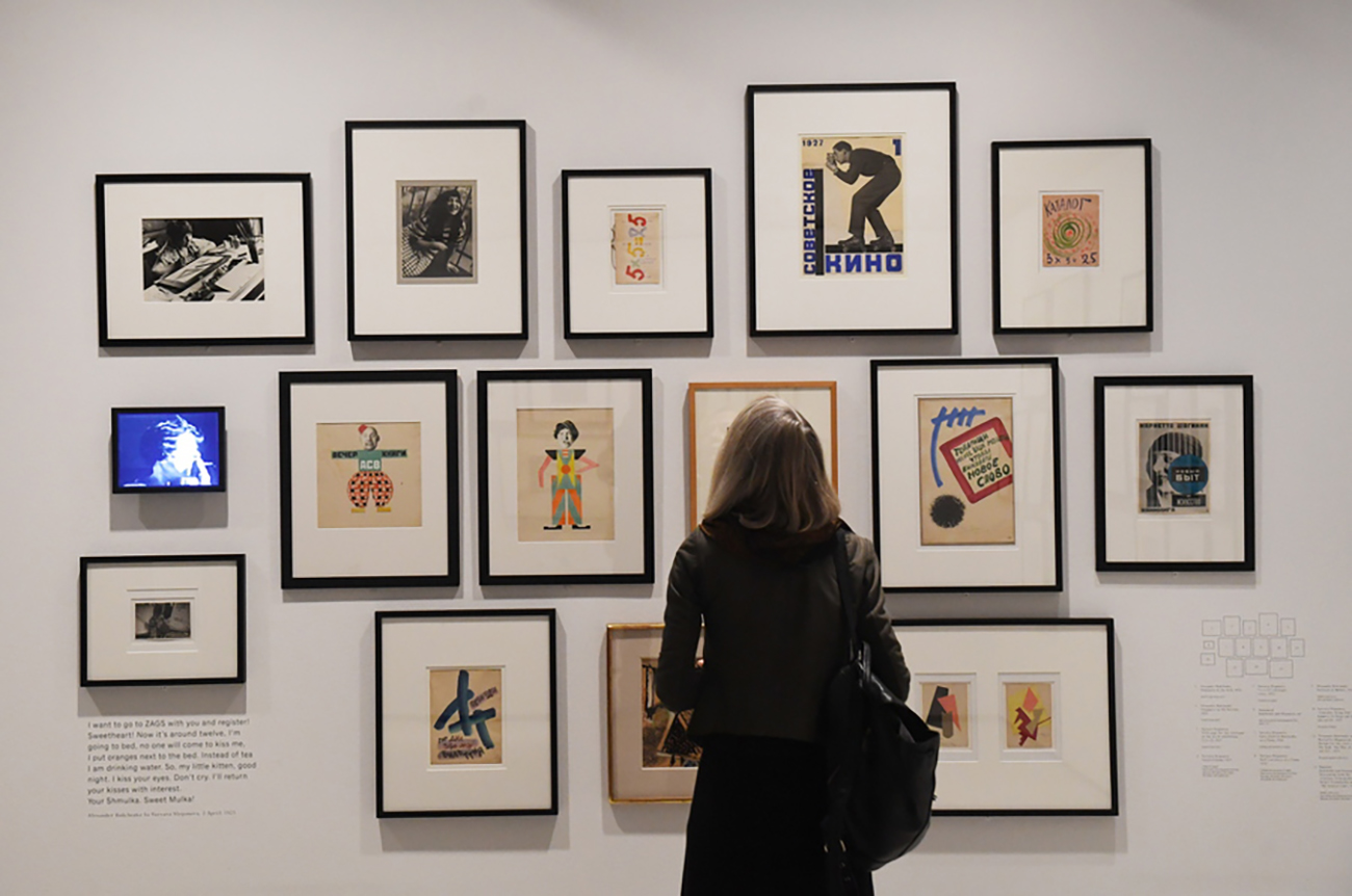 epa07081190 A visitior looks at painting by Russian artists Varvara Stepanova and Alexander Rodchenko during a photocall for the launch of Modern Couples: Art, Intimacy and the Avant-Grade" exhibition in London, Britain, 09 October 2018. Modern Couples explores creative relationships, across painting, sculpture, photography, design and literature through artist couples that forged new ways of making art. The exhibition highlights famous couples Dora Maar and Pablo Picasso; Salvador DalÃ­ and Federico GarcÃ­a Lorca; Camille Claudel and Auguste Rodin; Frida Kahlo and Diego Rivera; Emilie FlÃ¶ge and Gustav Klimt among others.  EPA