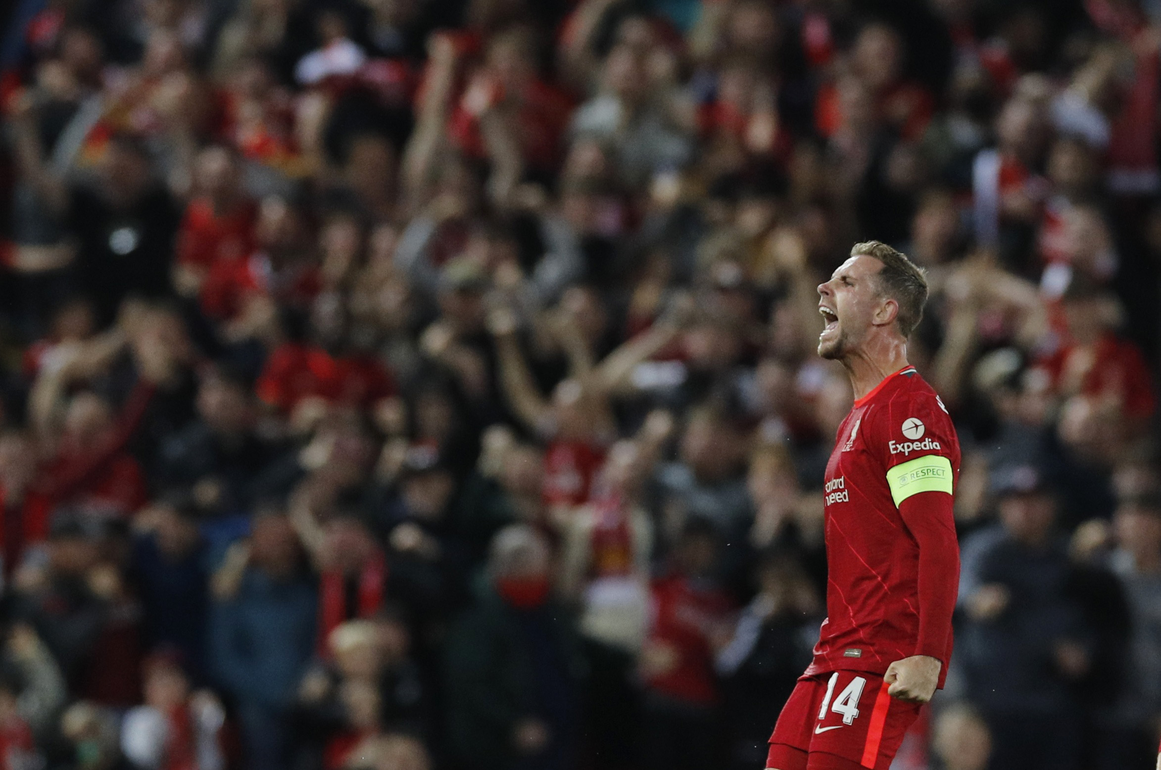 Soccer Football - Champions League - Group B - Liverpool v AC Milan - Anfield, Liverpool, Britain - September 15, 2021 Liverpool's Jordan Henderson celebrates scoring their third goal REUTERS