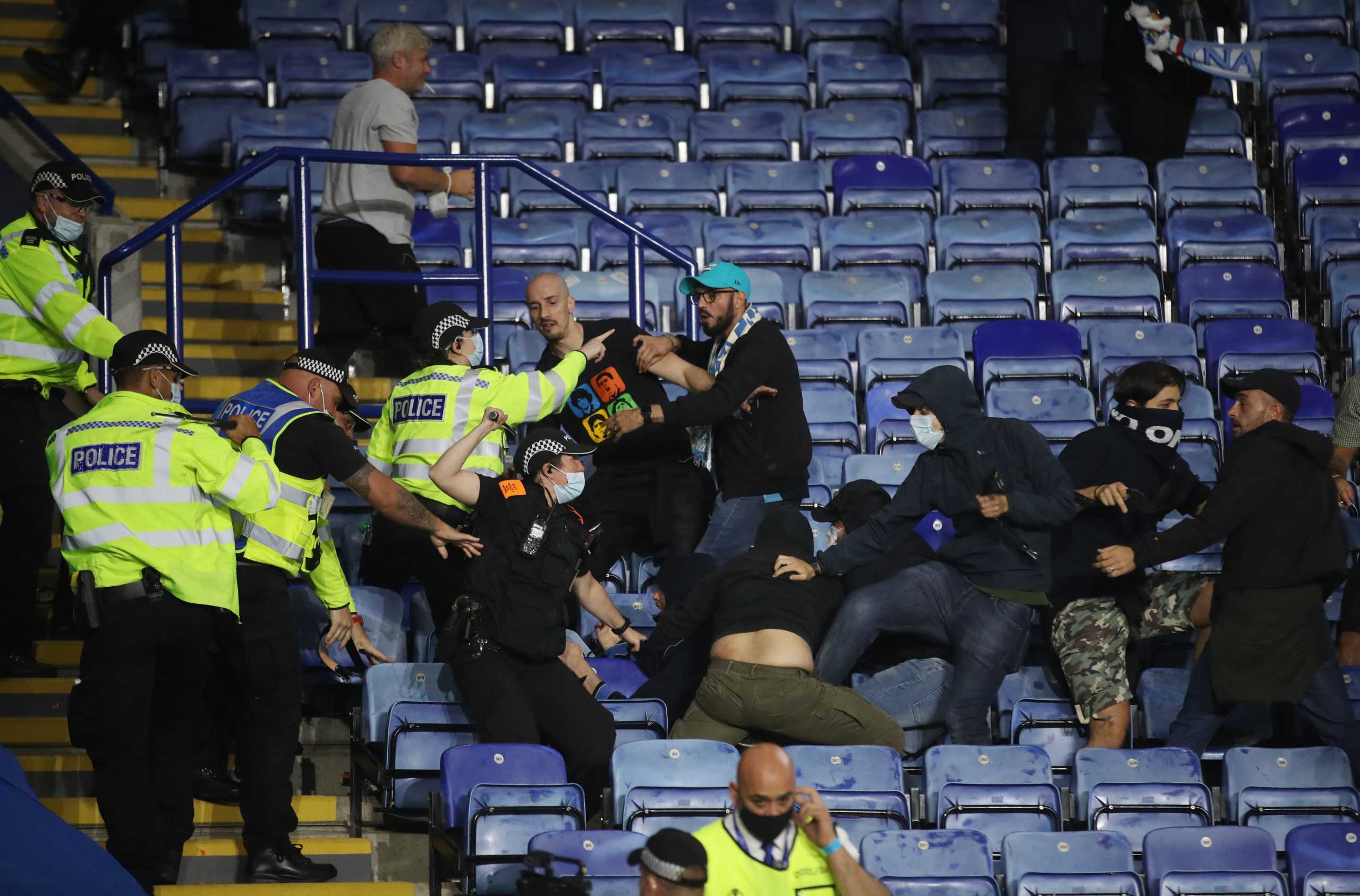 Soccer Football - Europa League - Group C - Leicester City v Napoli - King Power Stadium, Leicester, Britain - September 16, 2021 Police and Napoli fans clash after the match Action Images via REUTERS