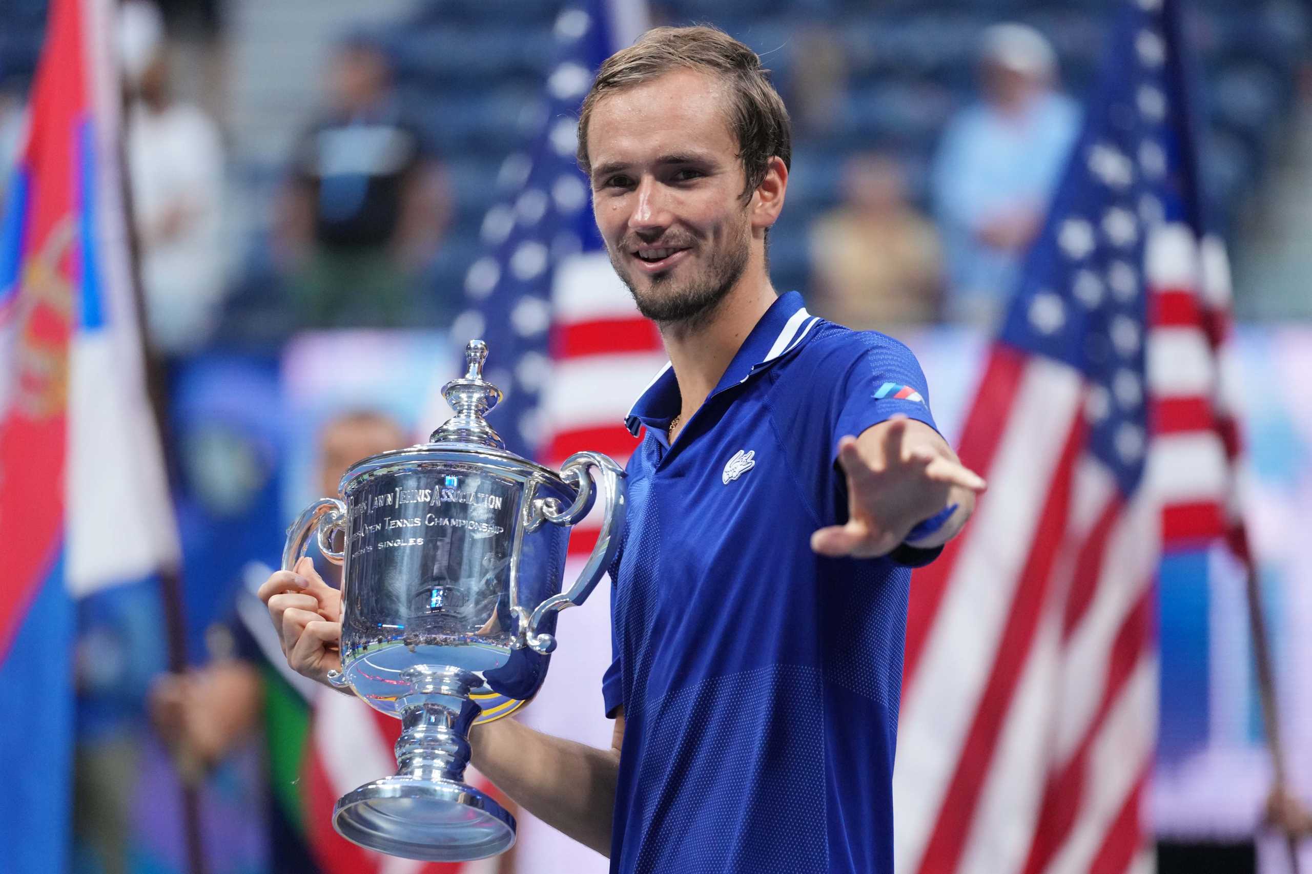Sep 12, 2021; Flushing, NY, USA; Daniil Medvedev of Russia celebrates with the championship trophy after his match against Novak Djokovic of Serbia (not pictured) in the men's singles final on day fourteen of the 2021 U.S. Open tennis tournament at USTA Billie Jean King National Tennis Center. Mandatory Credit: Danielle Parhizkaran-USA TODAY Sports