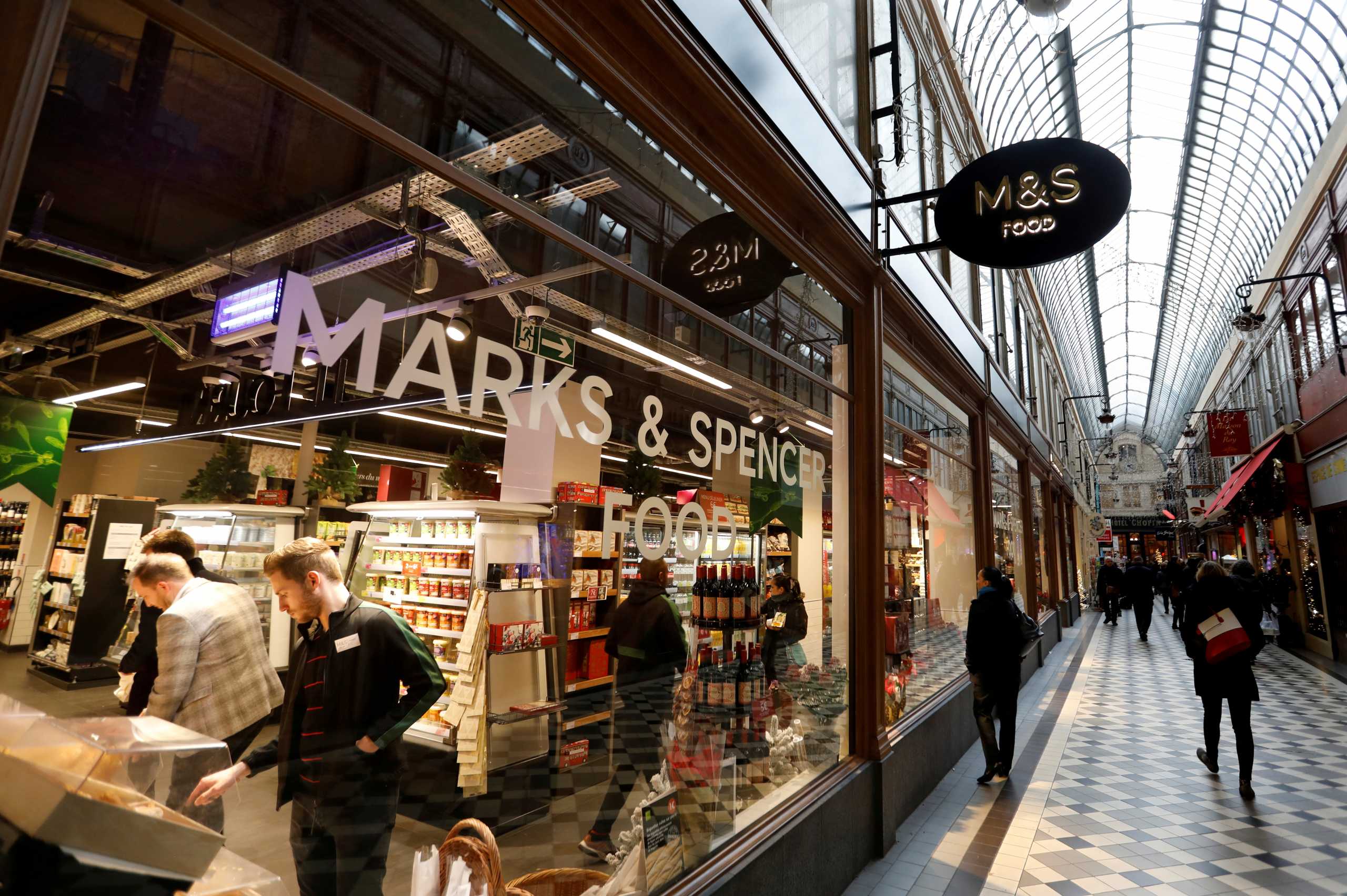 FILE PHOTO: A Marks and Spencer store is seen in the covered Jouffroy passage in Paris, France, December 11, 2018. REUTERS