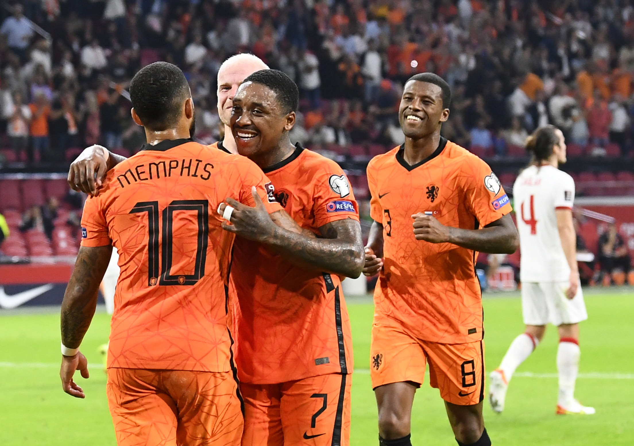 Soccer Football - World Cup - UEFA Qualifiers - Group G - Netherlands v Turkey - Johan Cruijff ArenA, Amsterdam, Netherlands - September 7, 2021 Netherlands' Memphis Depay celebrates scoring their third goal with Steven Bergwijn REUTERS
