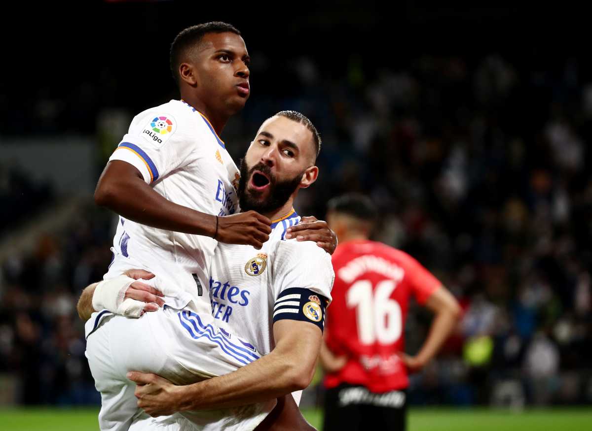 Soccer Football - LaLiga - Real Madrid v RCD Mallorca - Santiago Bernabeu, Madrid, Spain - September 22, 2021 Real Madrid's Karim Benzema celebrates scoring a goal with Rodrygo that is later disallowed after a VAR review REUTERS