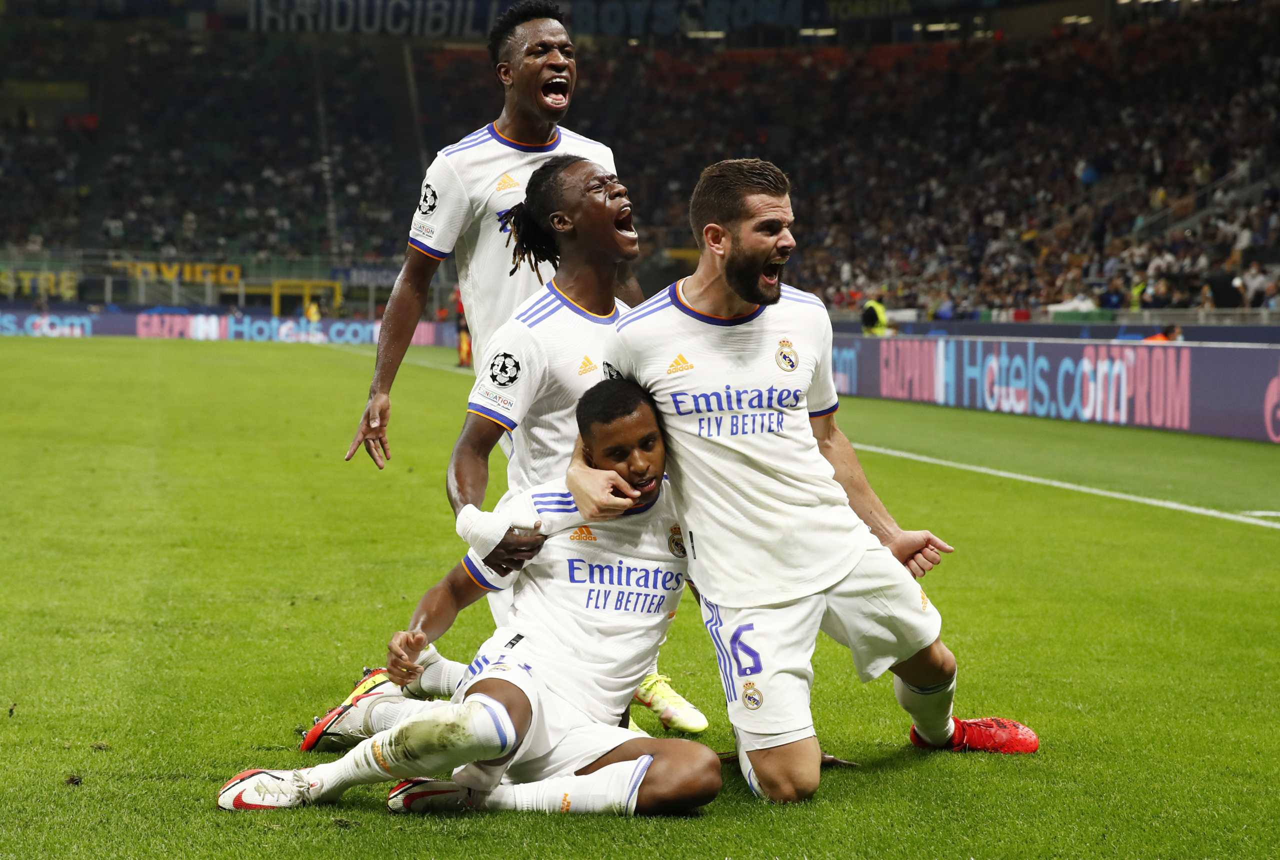 Soccer Football - Champions League - Group D - Inter Milan v Real Madrid - San Siro, Milan, Italy - September 15, 2021 Real Madrid's Rodrygo celebrates scoring their first goal with teammates REUTERS