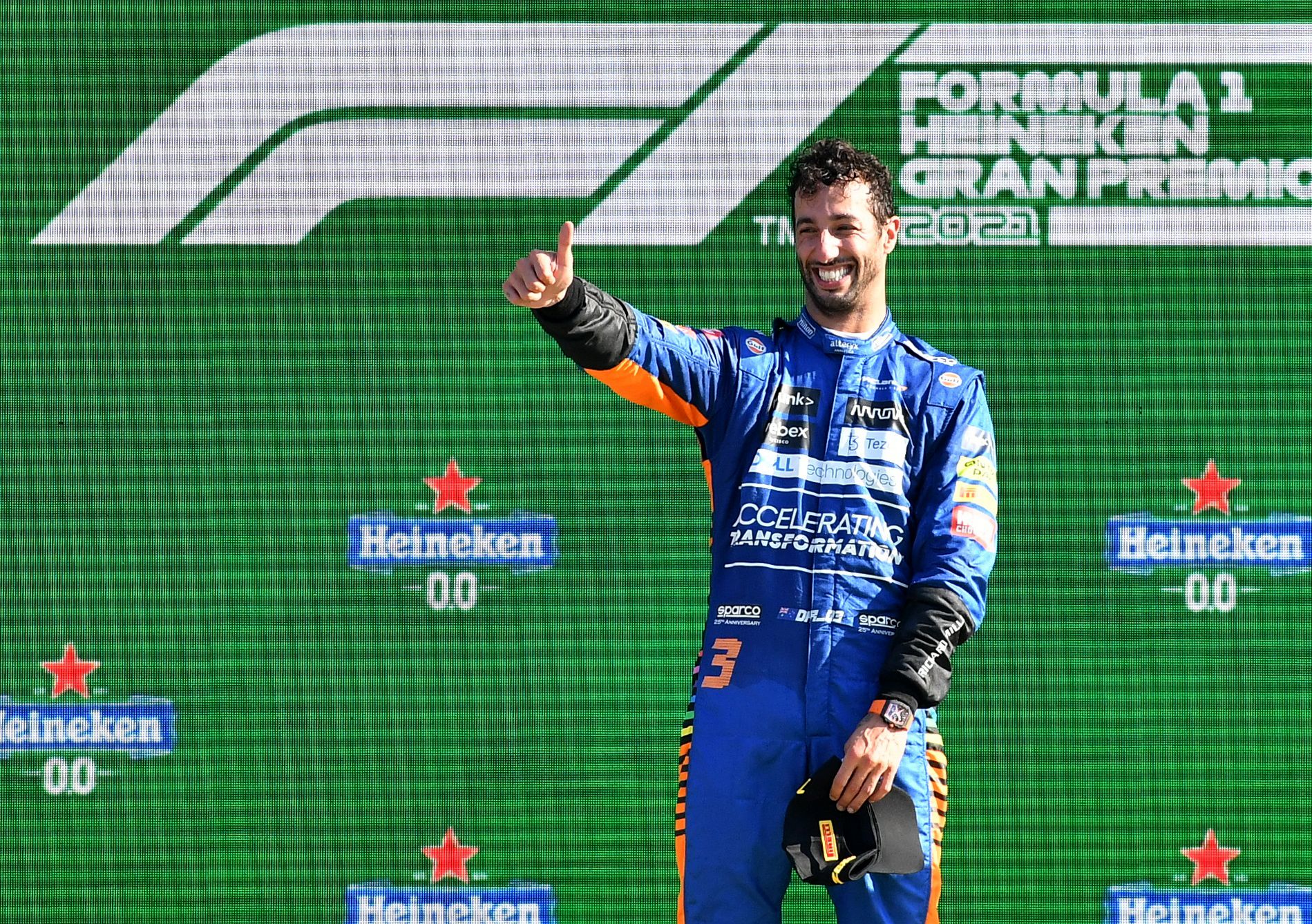 Formula One F1 - Italian Grand Prix - Autodromo Nazionale Monza, Monza, Italy - September 12, 2021 McLaren's Daniel Ricciardo celebrates on the podium with after winning the race REUTERS