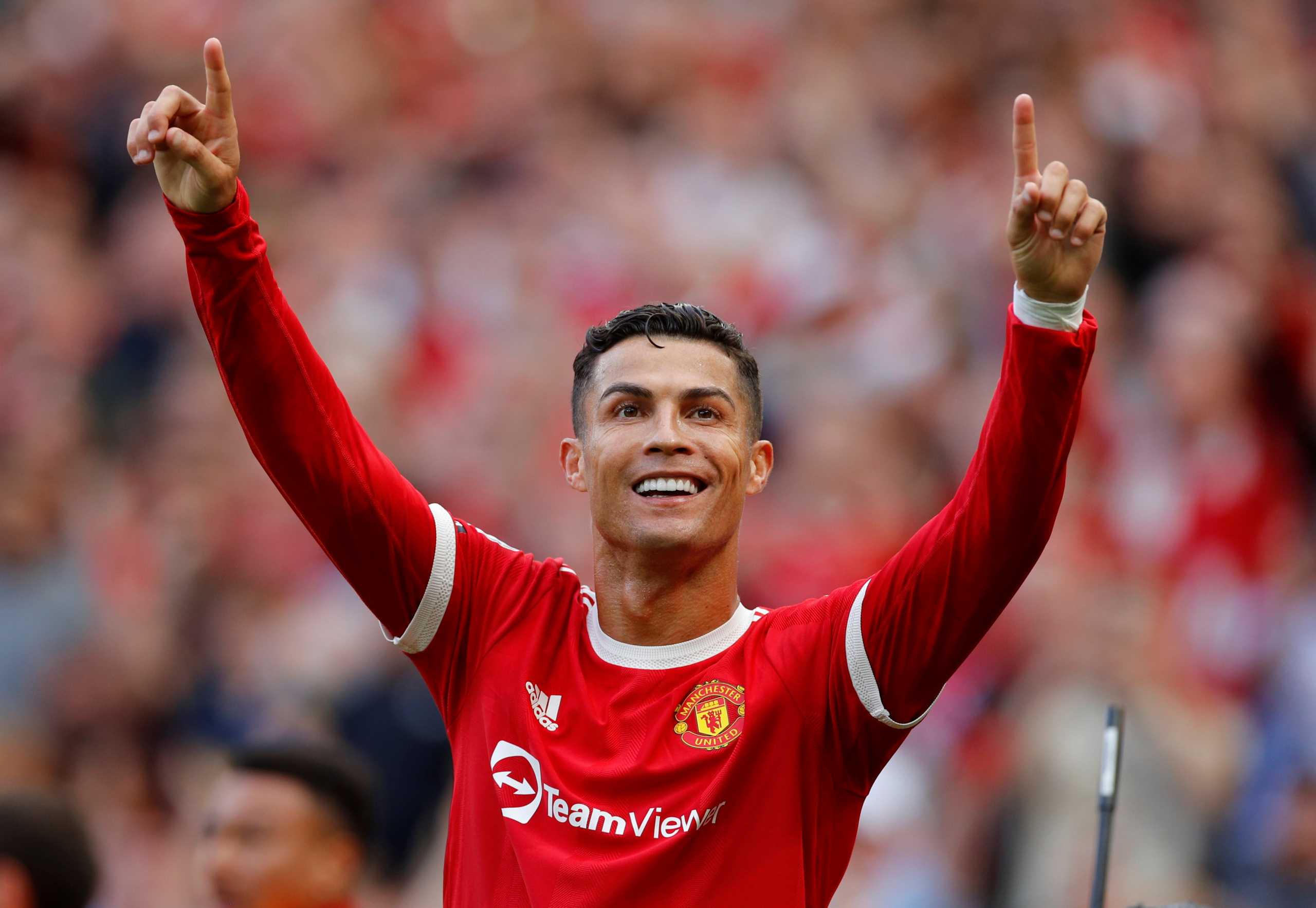 Soccer Football - Premier League - Manchester United v Newcastle United - Old Trafford, Manchester, Britain - September 11, 2021 Manchester United's Cristiano Ronaldo celebrates scoring their second goal REUTERS