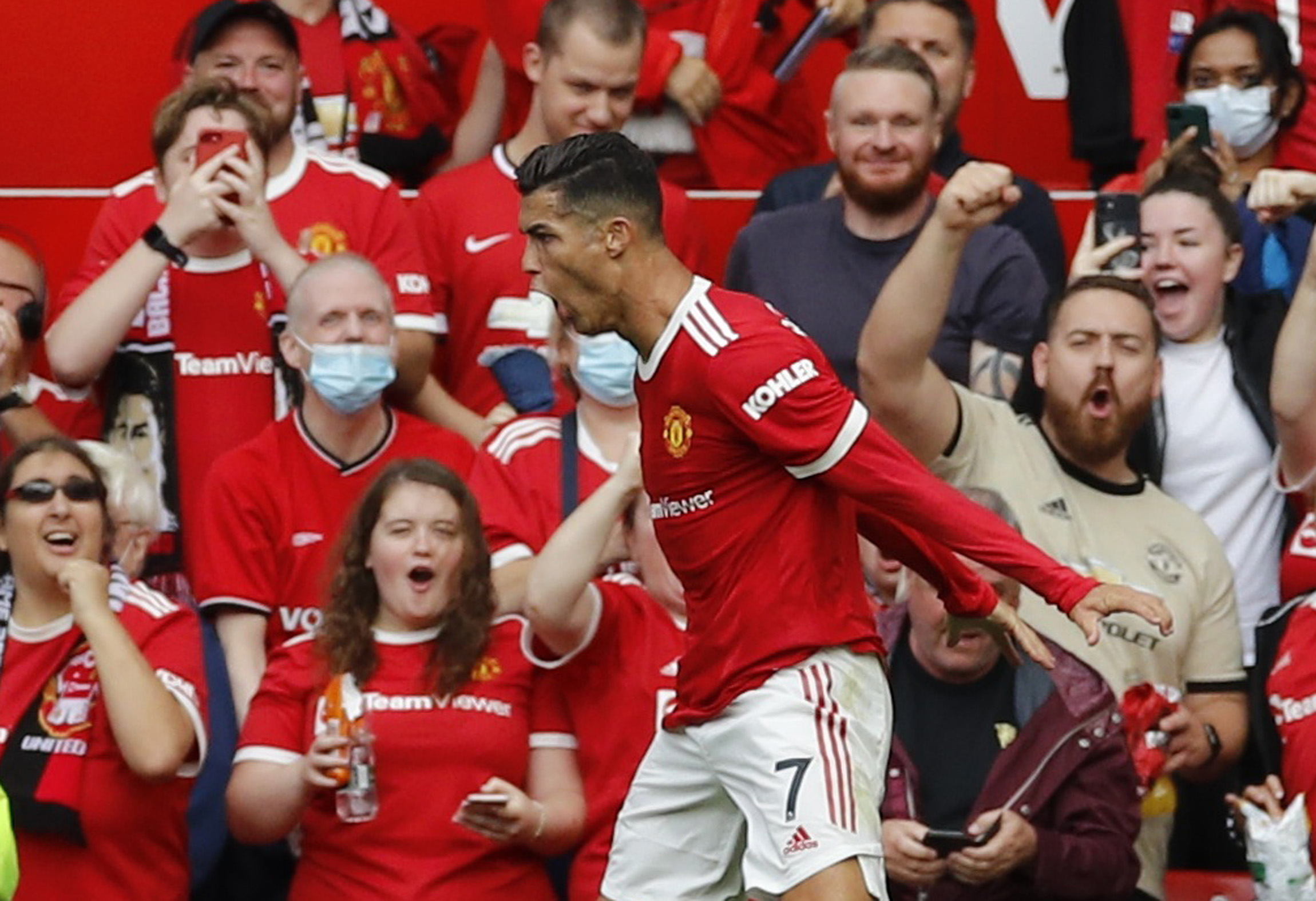 Soccer Football - Premier League - Manchester United v Newcastle United - Old Trafford, Manchester, Britain - September 11, 2021 Manchester United's Cristiano Ronaldo celebrates scoring their first goal REUTERS