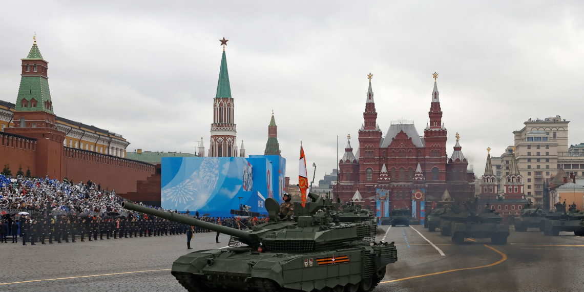 Russian service members drive T-90M and other tanks during a military parade on Victory Day, which marks the 76th anniversary of the victory over Nazi Germany in World War Two, in Red Square in central Moscow, Russia May 9, 2021. REUTERS