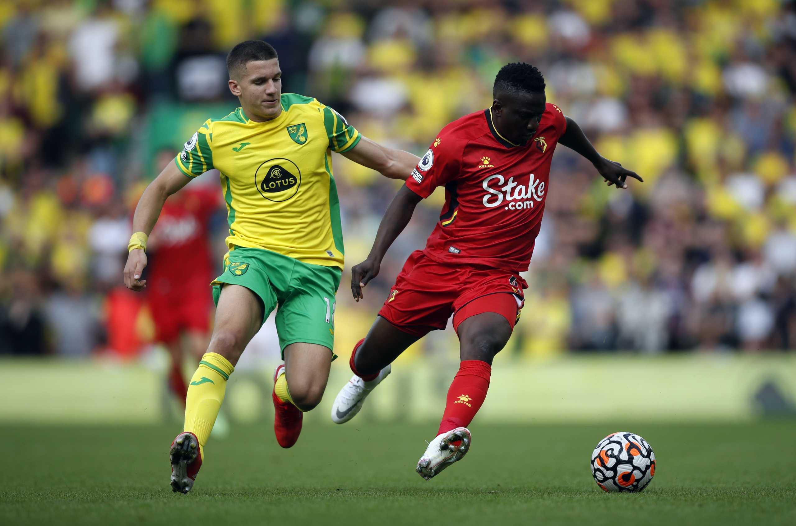 Soccer Football - Premier League - Norwich City v Watford - Carrow Road, Norwich, Britain - September 18, 2021  Norwich City's Christos Tzolis in action with Watford's Peter Etebo Action Images via Reuters