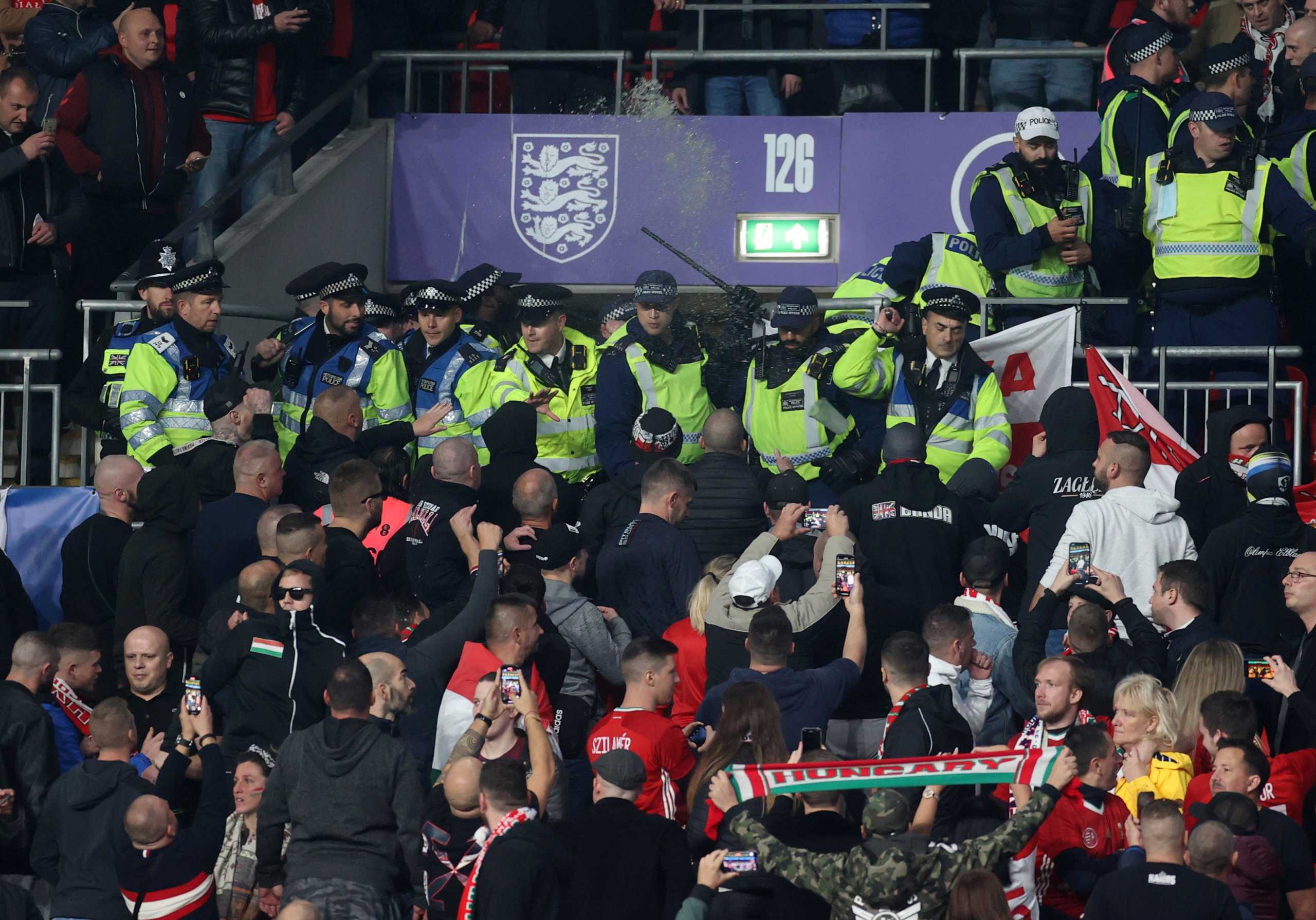 Soccer Football - World Cup - UEFA Qualifiers - Group I - England v Hungary - Wembley Stadium, London, Britain - October 12, 2021 General view as Police clash with Hungary fans during the match Action Images via Reuters