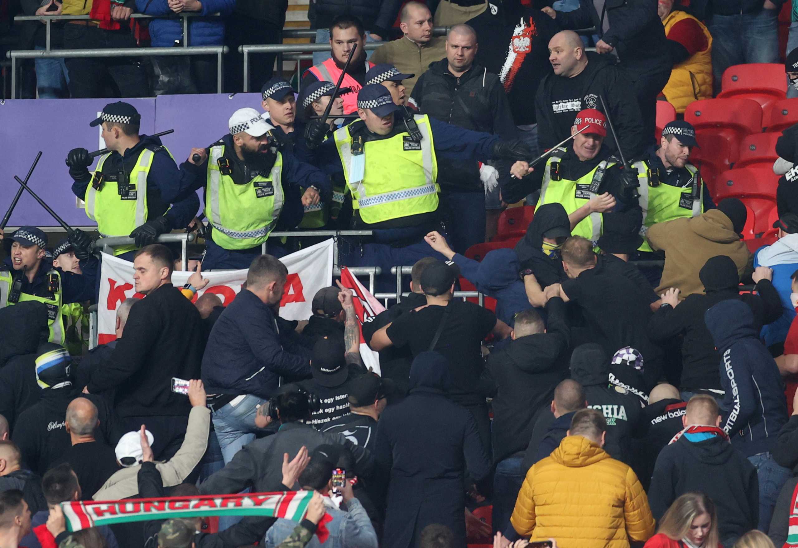 Soccer Football - World Cup - UEFA Qualifiers - Group I - England v Hungary - Wembley Stadium, London, Britain - October 12, 2021 Police clash with Hungary fans during the match Action Images via Reuters