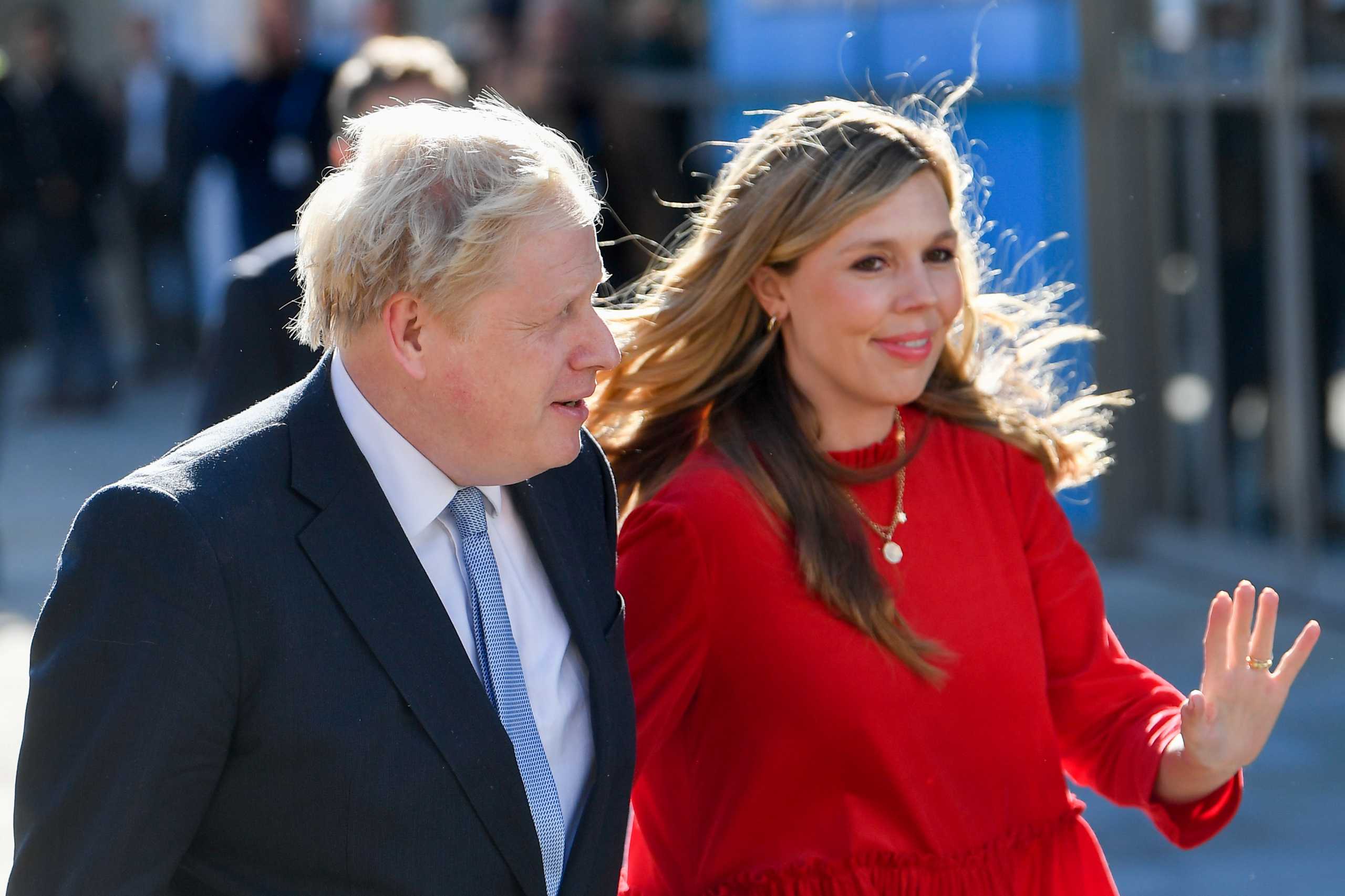 Britain's Prime Minister Boris Johnson and his wife Carrie Johnson arrive to attend the annual Conservative Party Conference, in Manchester, Britain, October 6, 2021. REUTERS