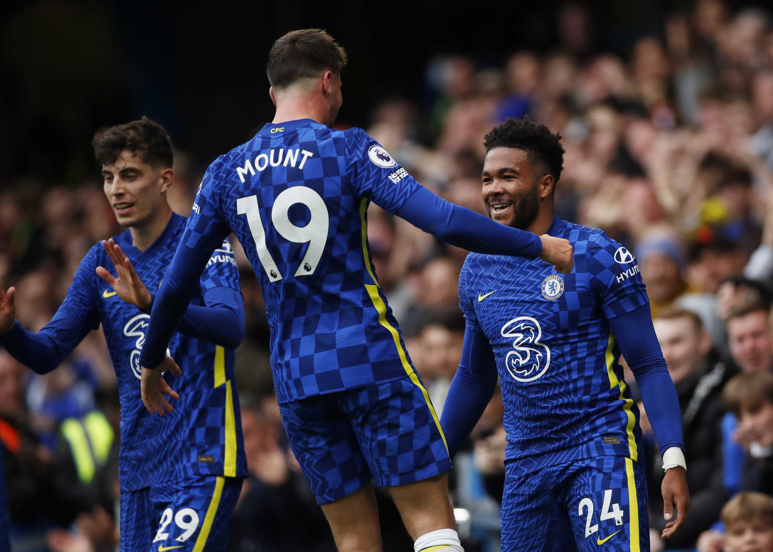 Soccer - England - Premier League - Chelsea v Norwich City - Stamford Bridge, London, Britain - October 23, 2021 Chelsea's Reece James celebrates scoring their third goal with Mason Mount Action Images via Reuters