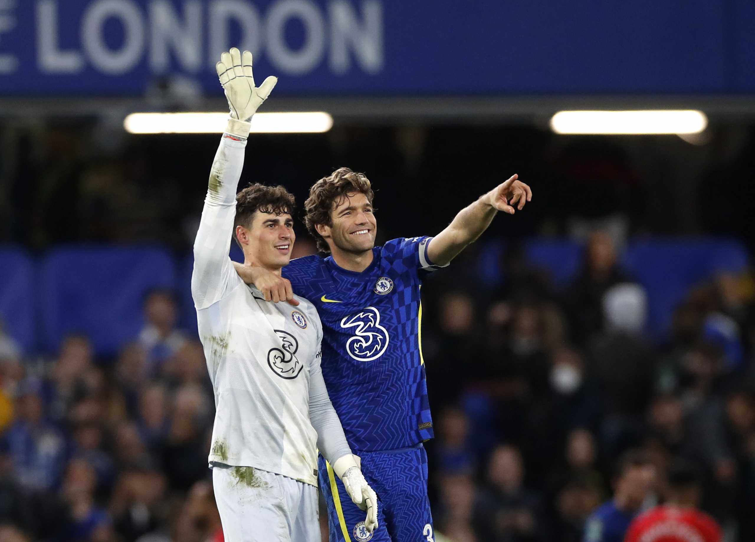 Soccer Football - Carabao Cup - Round of 16 - Chelsea v Southampton - Stamford Bridge, London, Britain - October 26, 2021 Chelsea's Kepa Arrizabalaga and Marcos Alonso celebrate after winning the penalty shoot-out Action Images via Reuters