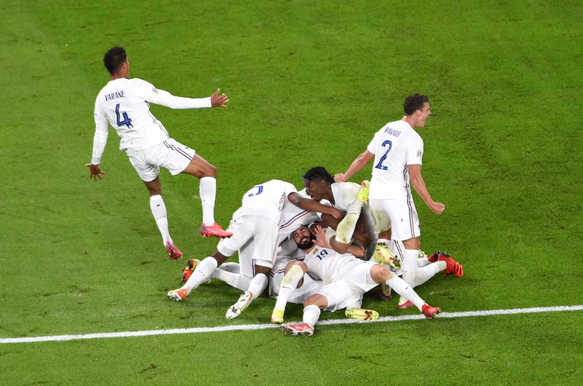 Soccer Football - Nations League - Semi Final - Belgium v France - Allianz Stadium, Turin, Italy - October 7, 2021 France's Theo Hernandez celebrates scoring their third goal with teammates Pool via REUTERS