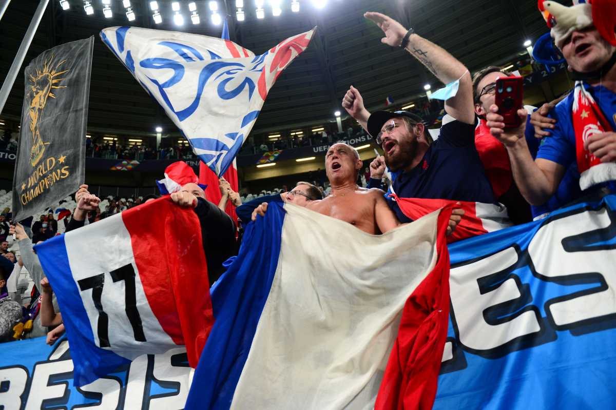 Soccer Football - Nations League - Semi Final - Belgium v France - Allianz Stadium, Turin, Italy - October 7, 2021 France fans celebrate after the match REUTERS