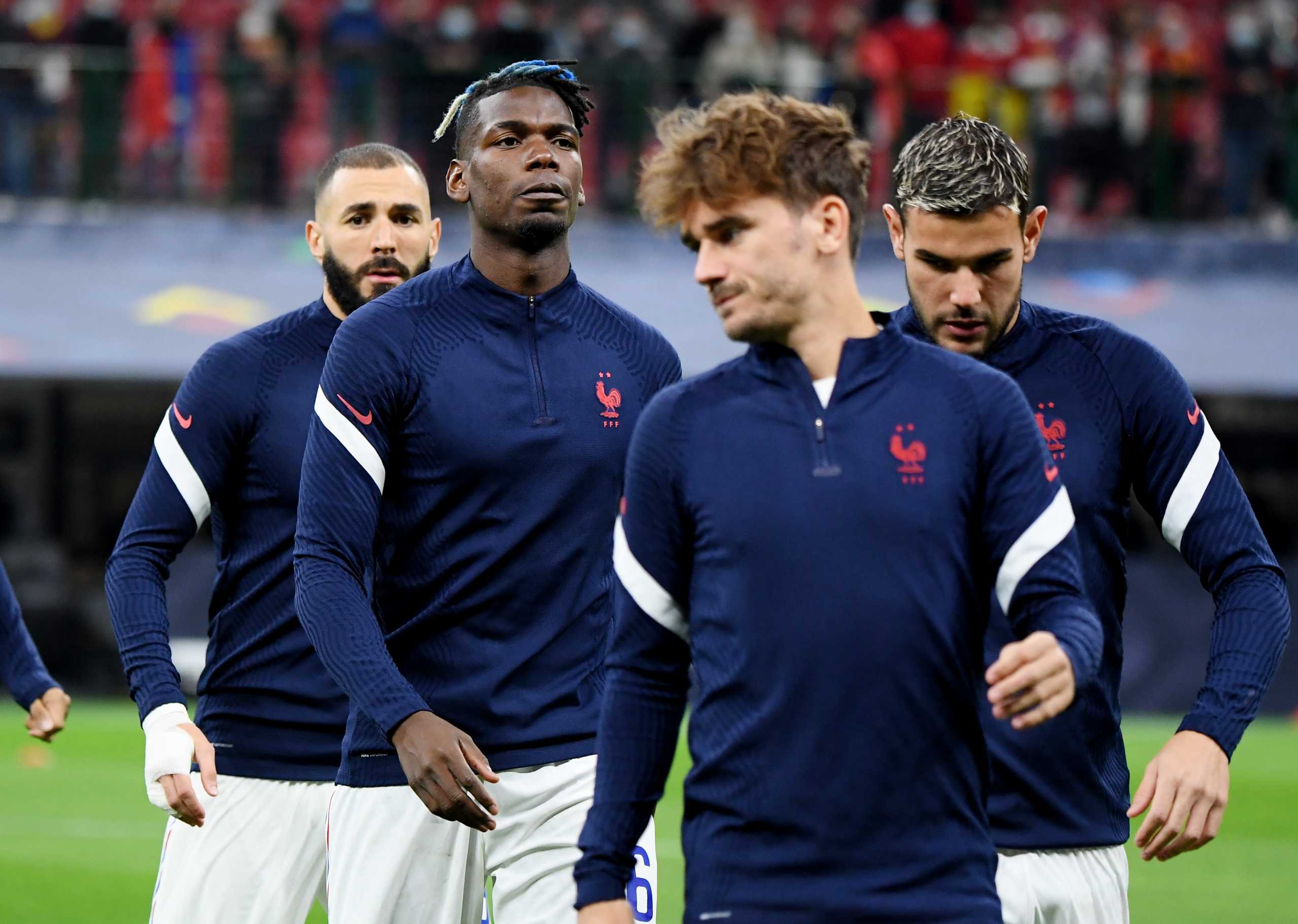 Soccer Football - Nations League - Final - Spain v France - San Siro, Milan, Italy - October 10, 2021 France's Karim Benzema and Paul Pogba during the warm up before the match REUTERS
